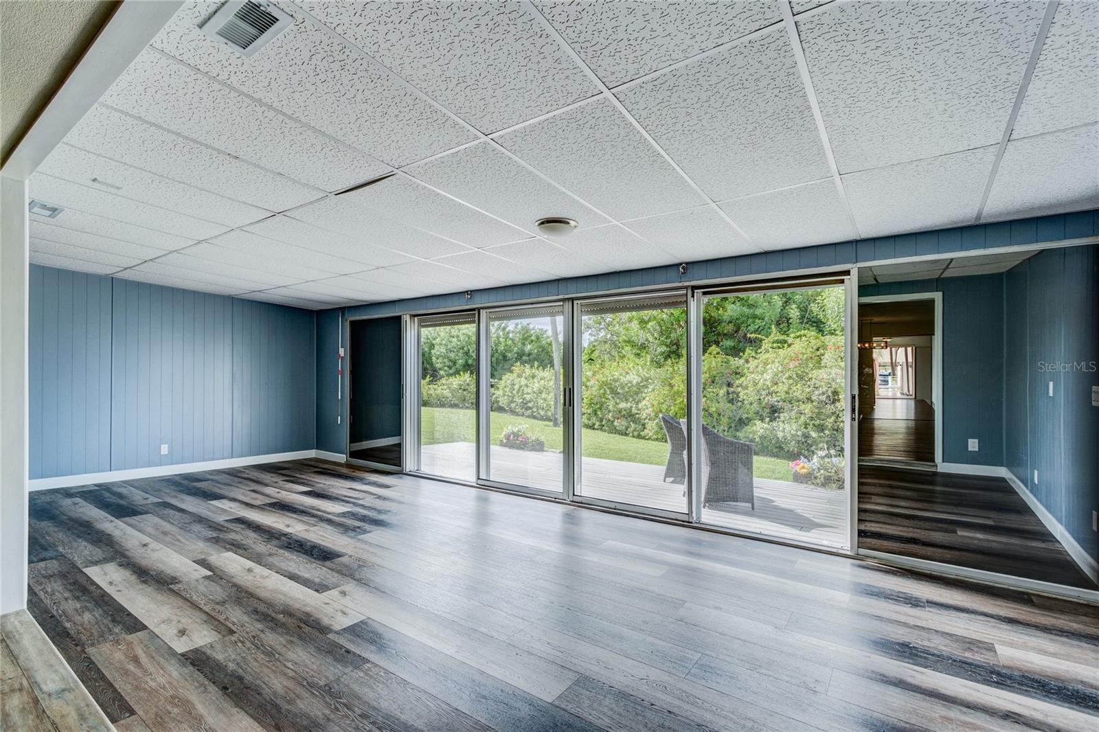 12x26 "Bonus" Florida Room is not included in the official square footage. Sliders pocket to the left and right. Power roll-up storm shutters for protection from the elements. - 186 BOCA CIEGA POINT SOUTH BLVD, ST PETERSBURG
