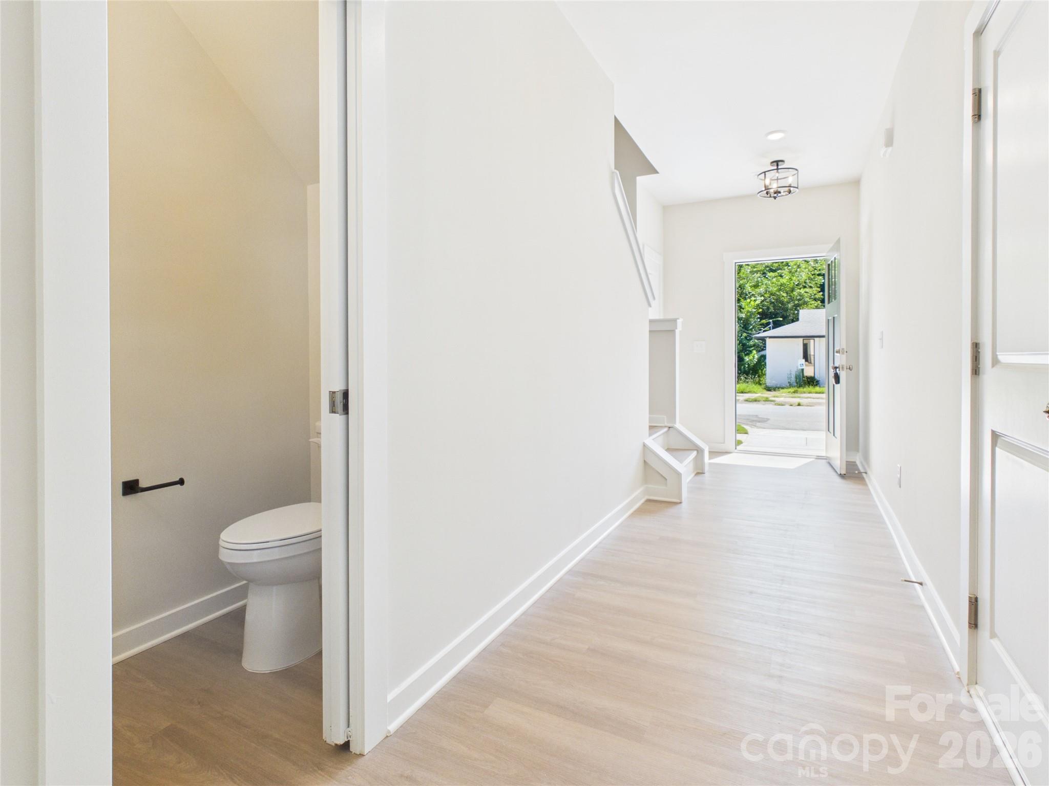 View of half bath and entry - 105 Dilling Street N, Kings Mountain