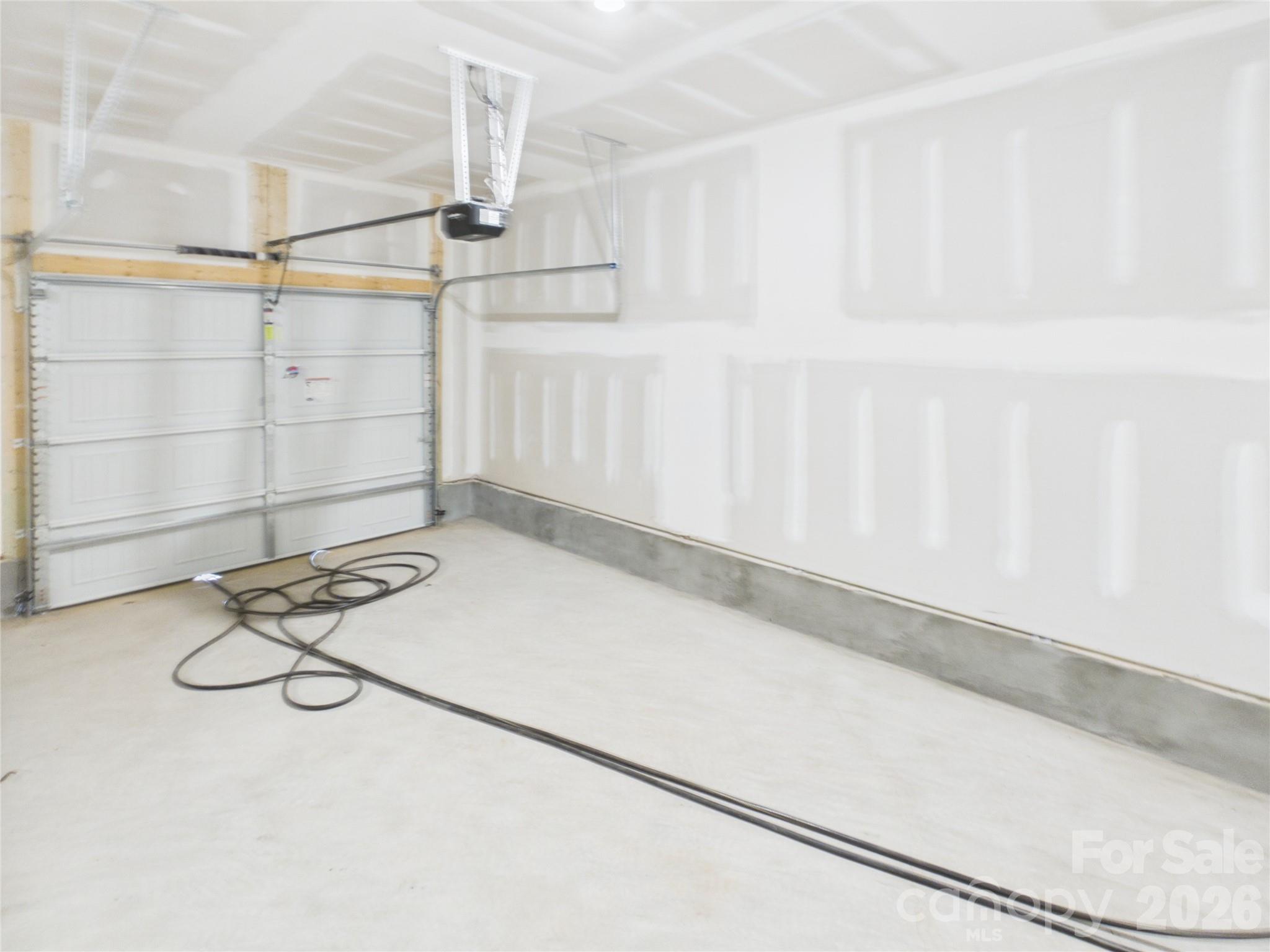 1 Car garage with 2 car parking pad in driveway - 105 Dilling Street N, Kings Mountain