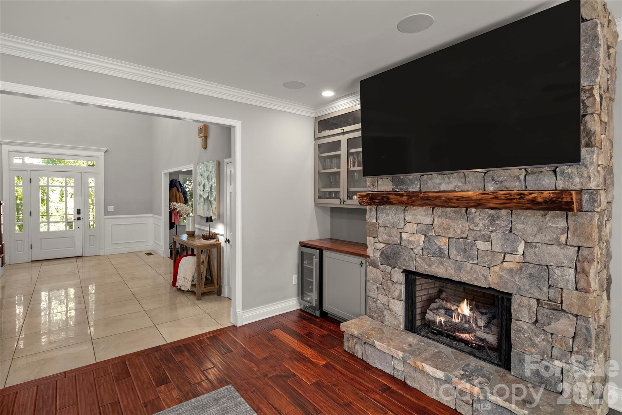 Living room features stone fireplace Brazilian cherry floors - 349 View Rock Lane, Hendersonville