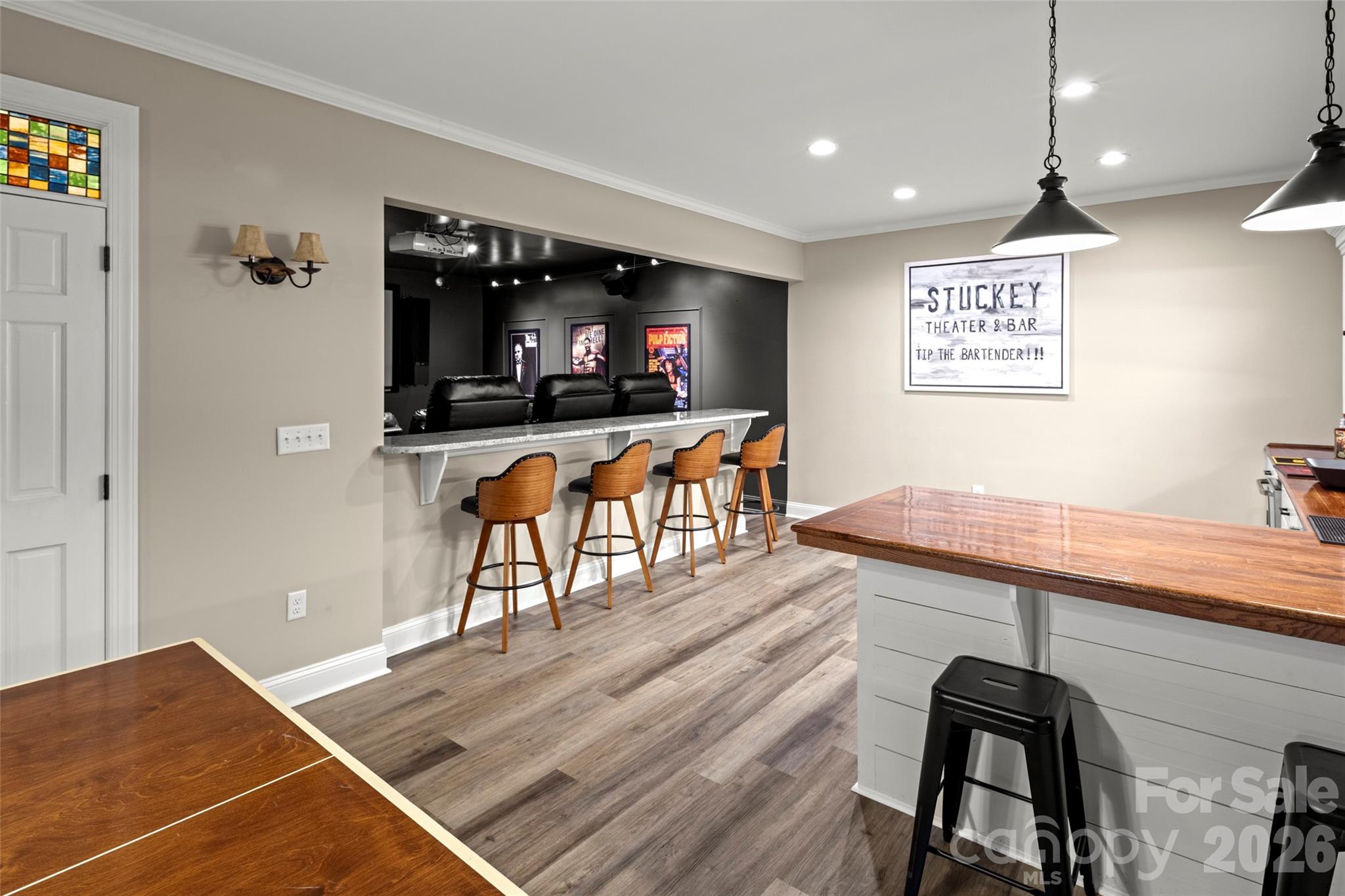 Bar seating looking in to theater room - 349 View Rock Lane, Hendersonville