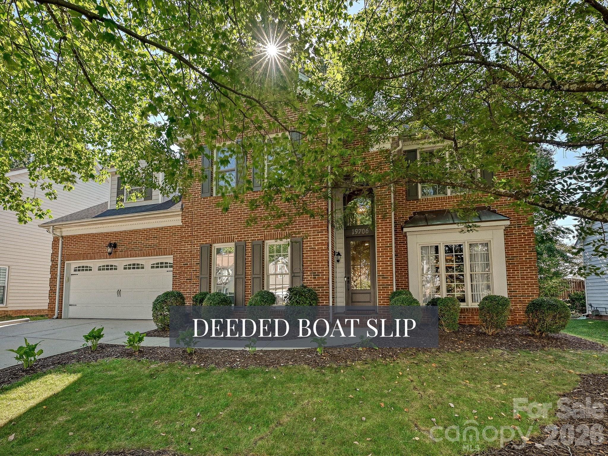 Beautiful two-story Cornelius home in the sought-after Blue Stone Harbor community featuring a two-car garage and deeded Lake Norman boat slip #121. - 19706 Valiant Way, Cornelius