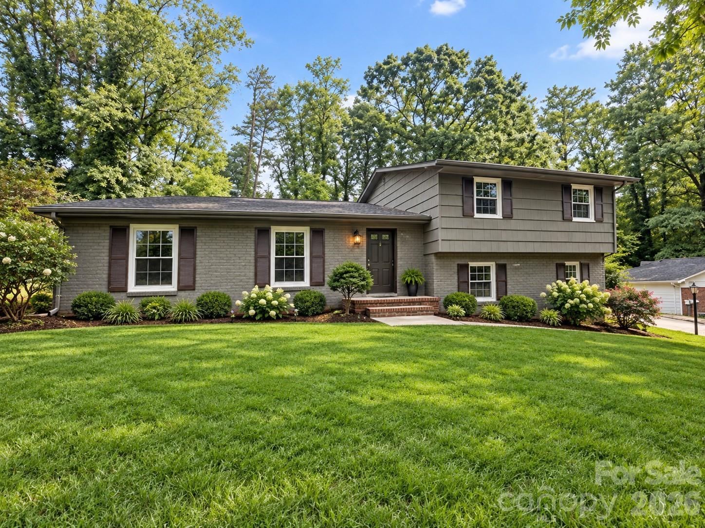 Photo enhanced with landscaping upgrades - 845 Cherokee Place SW, Lenoir
