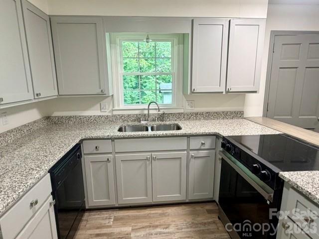 Kitchen with new granite tops, cabinet doors and fronts, as well as new range - 845 Cherokee Place SW, Lenoir