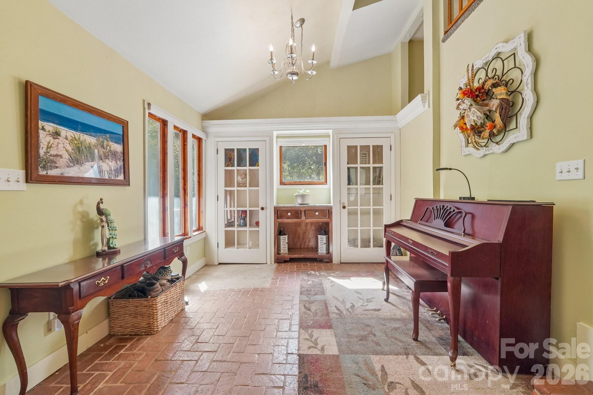 Spacious 2-story, entry-way with brick flooring. - 2701 Cedar Trail Lane, Wingate