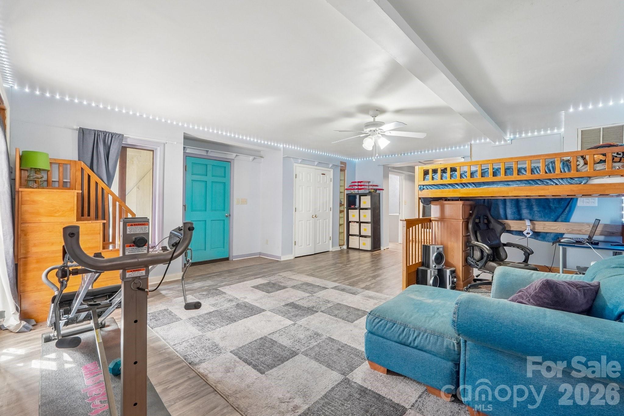 Completed basement with walkout to 3-car garage and backyard. - 2701 Cedar Trail Lane, Wingate