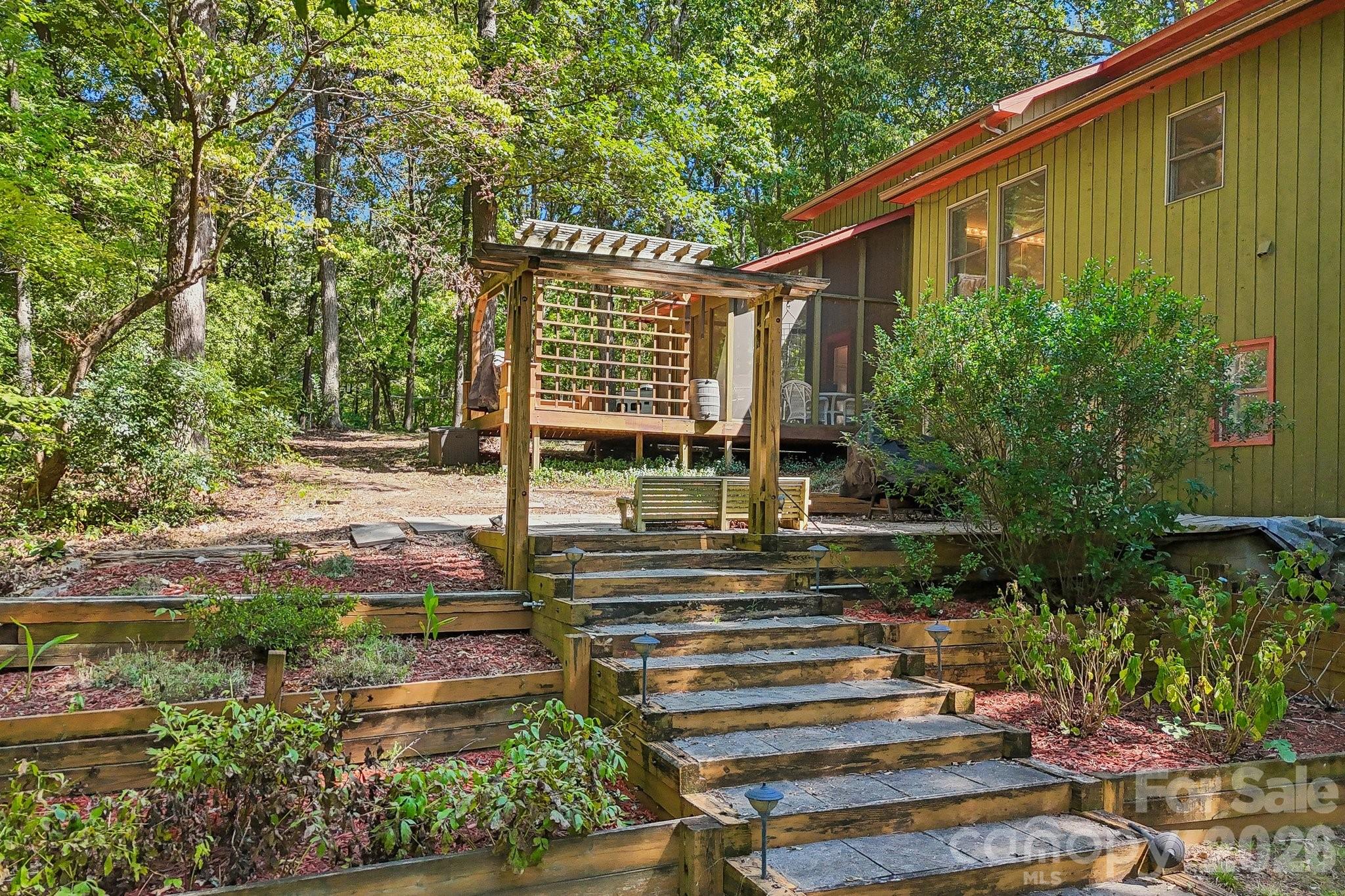 Backyard garden/deck, perfect for entertaining! - 2701 Cedar Trail Lane, Wingate