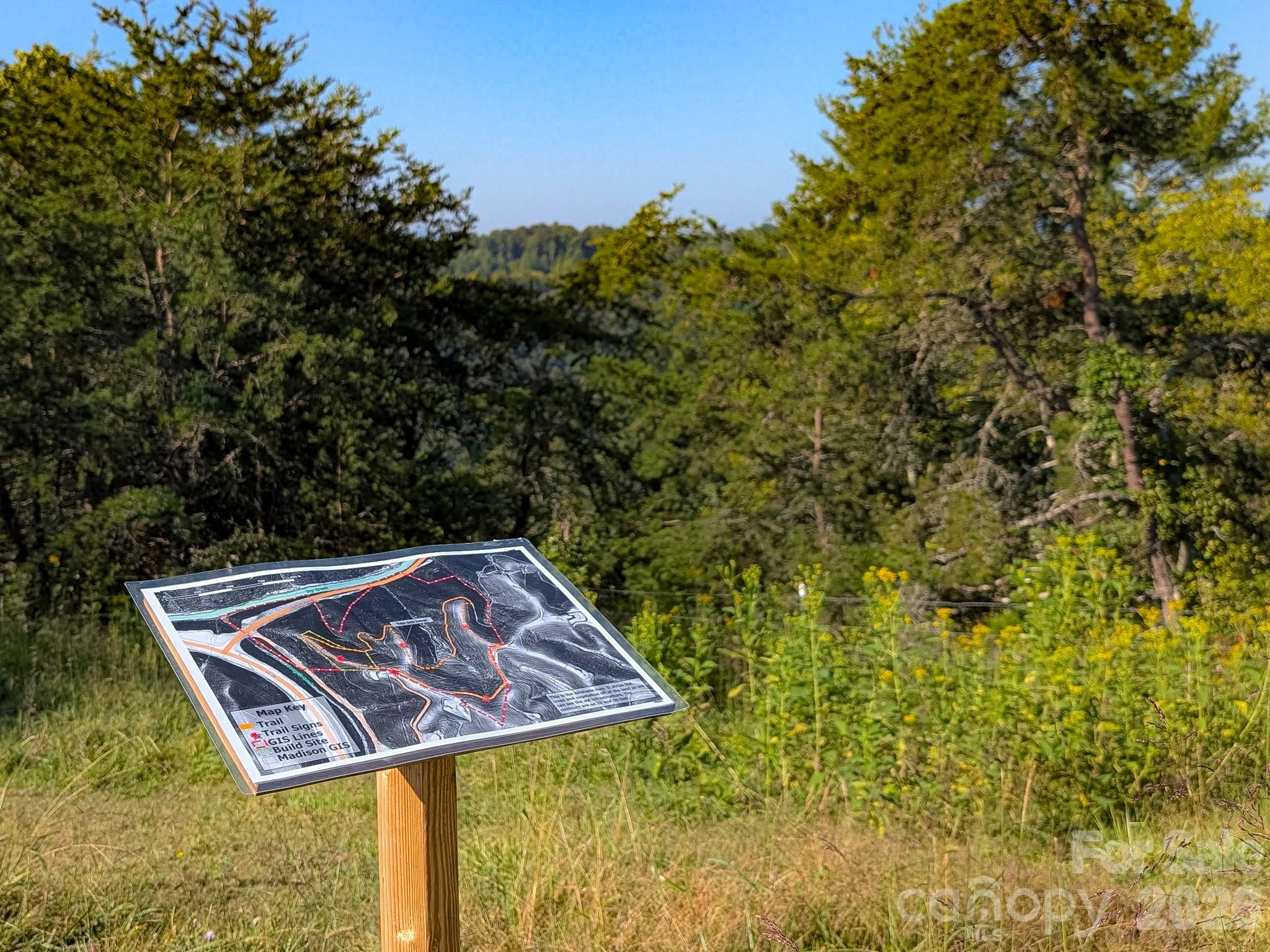 Trail maps scattered around property in 1+ mile walking tour. - 99999 Boulder Road, Marshall