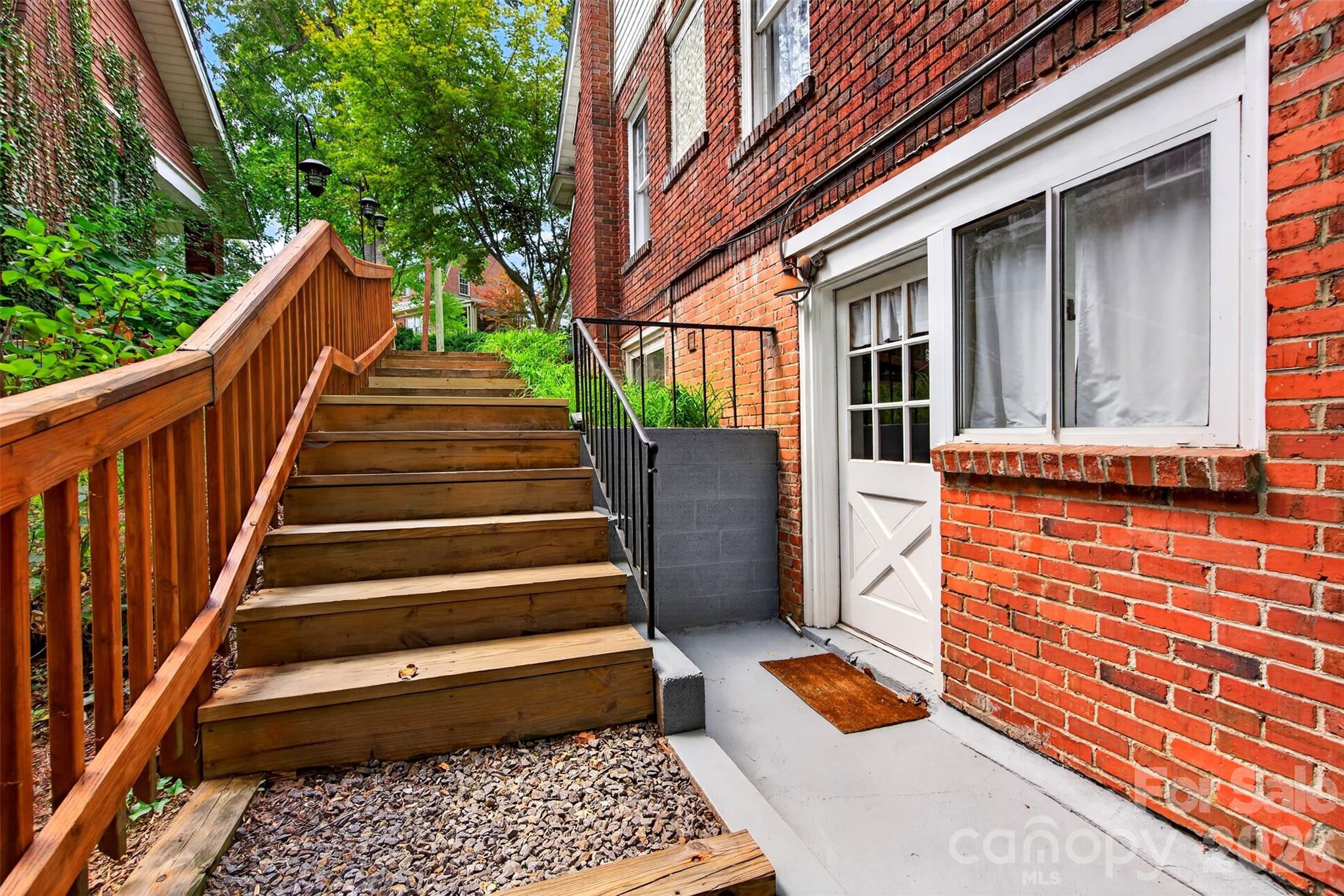 Outside entrance to basement efficiency apartment - 70 Saint Dunstans Circle, Asheville