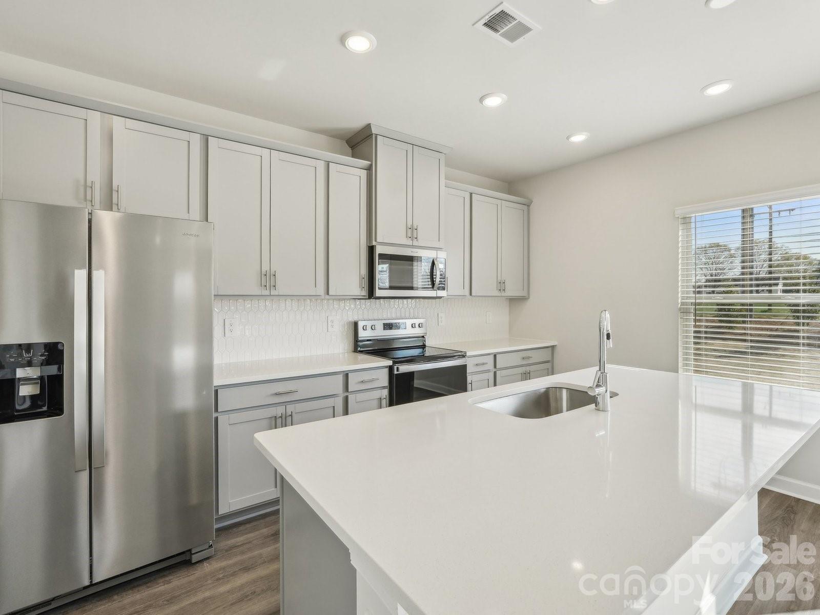 Photos are not of the actual home, but are photos of the builder home with same floorplan - 1609 Harper Landing Boulevard, Stanley