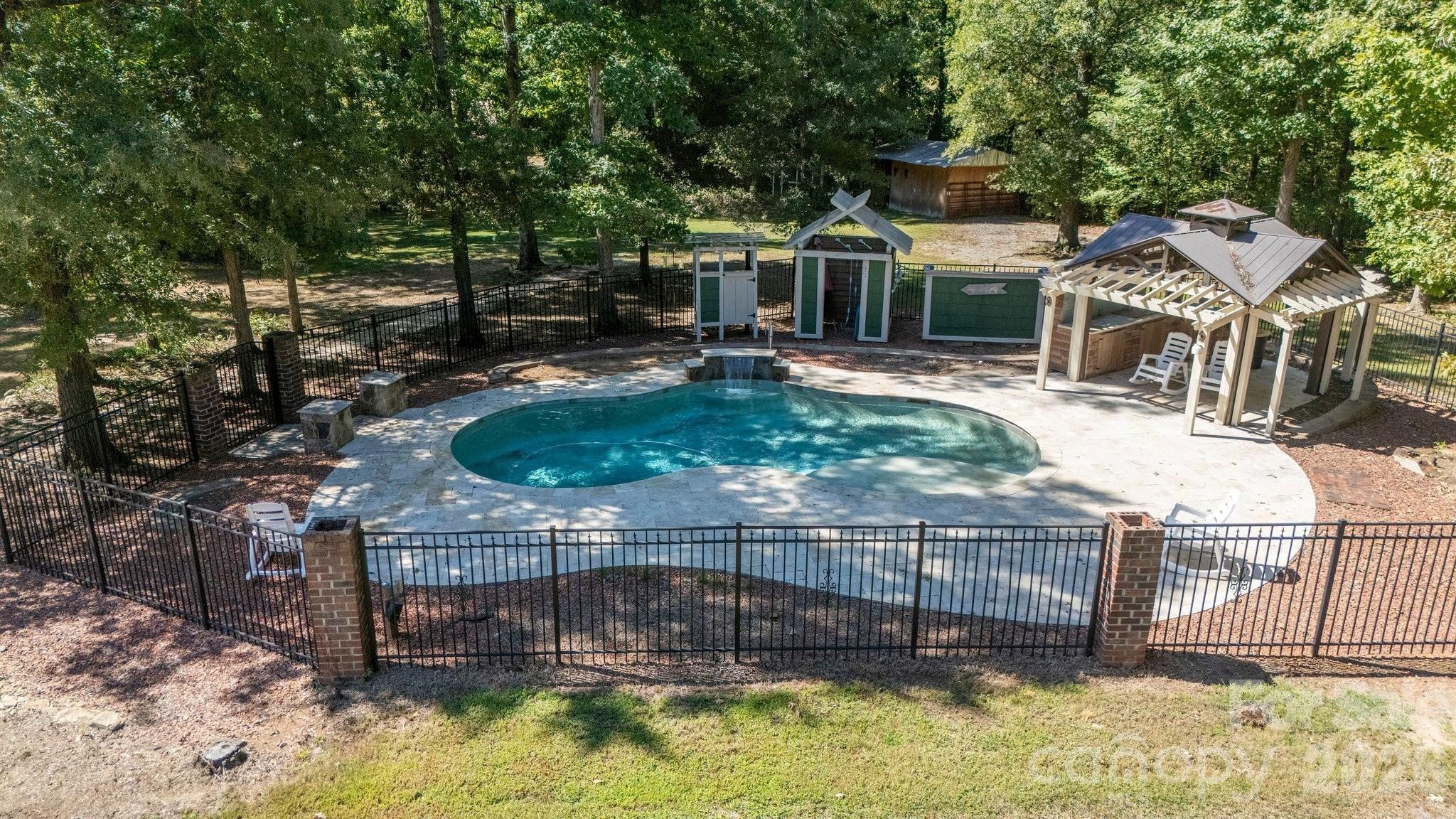 salt water pool with outdoor gazebo kitchen shower and pool house - 1517 Helms Short Cut Road, Monroe