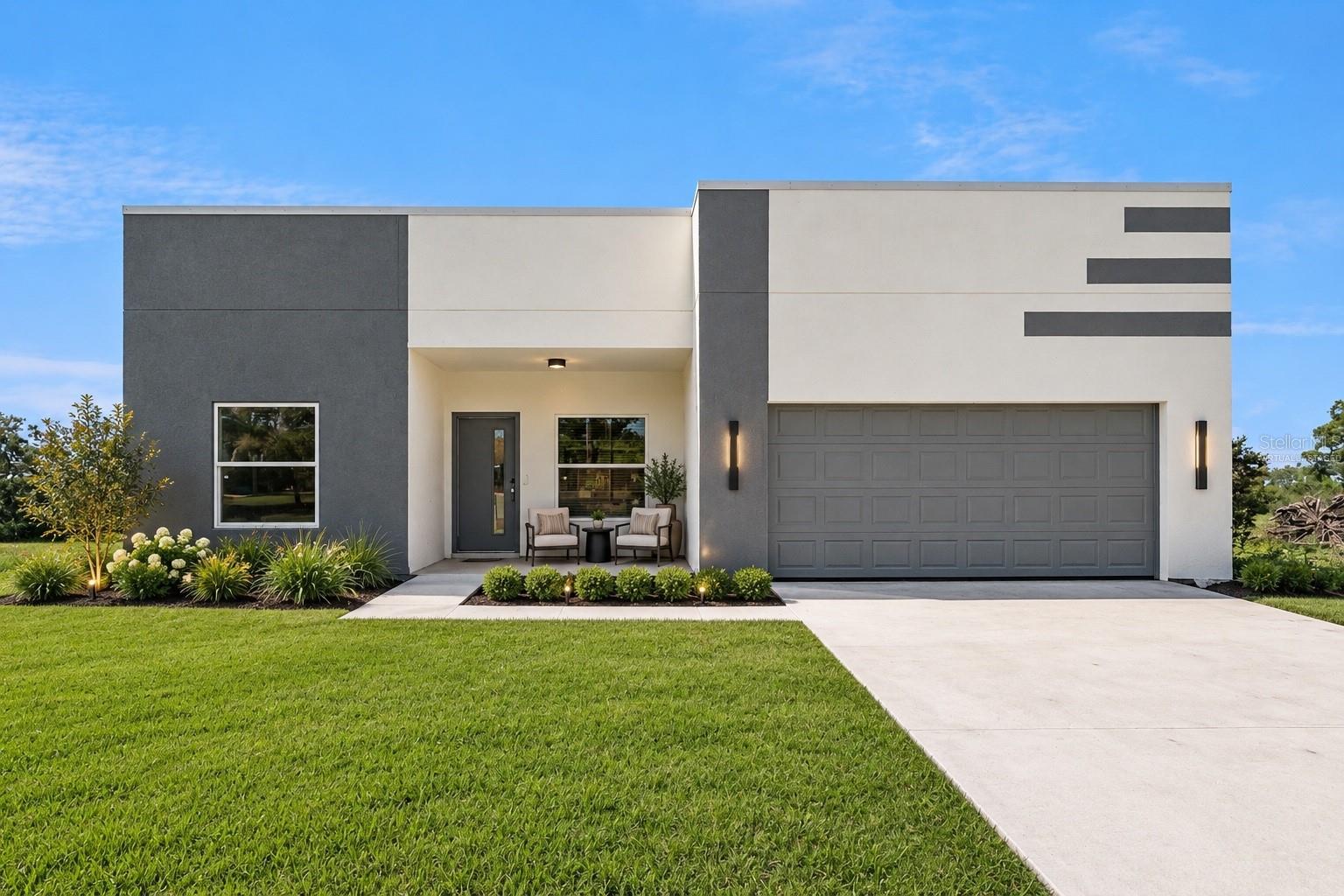 front of home - virtually staged - 397 NORTH BLVD W, DAVENPORT