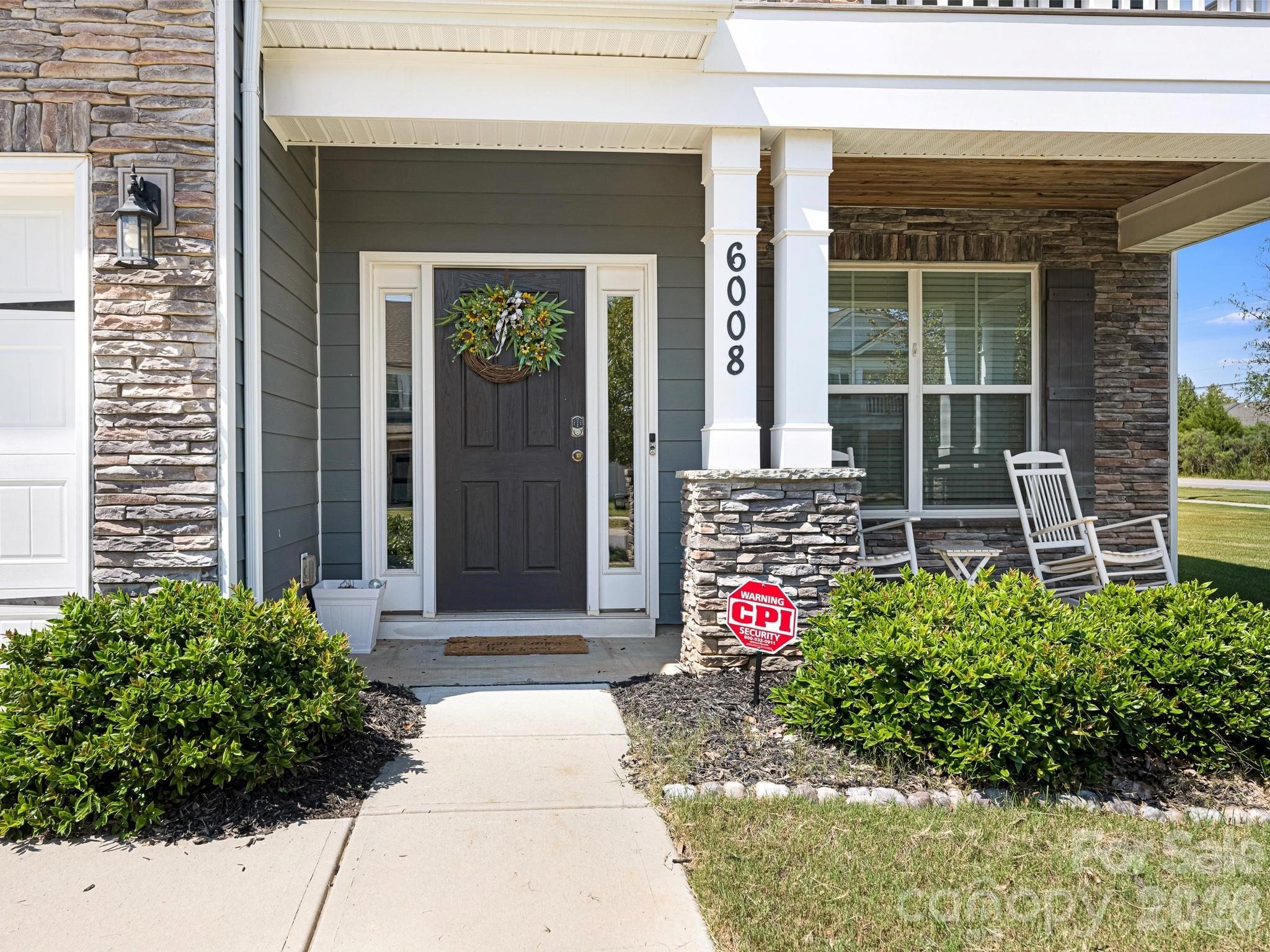 Front Entrance with covered porch - 6008 Hampstead Pond Lane, Matthews