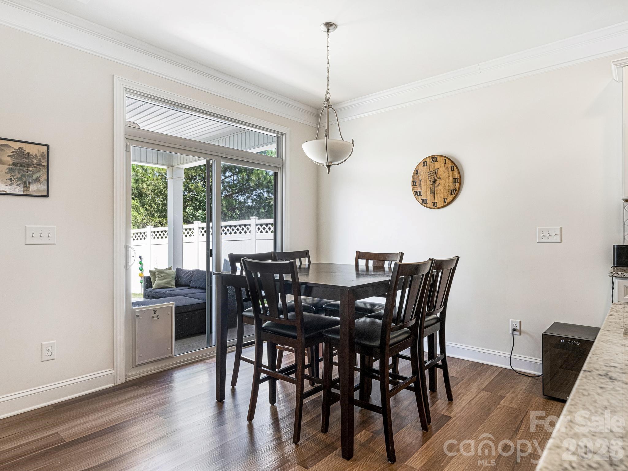 breakfast nook adjacent to kitchen and covered back patio - 6008 Hampstead Pond Lane, Matthews