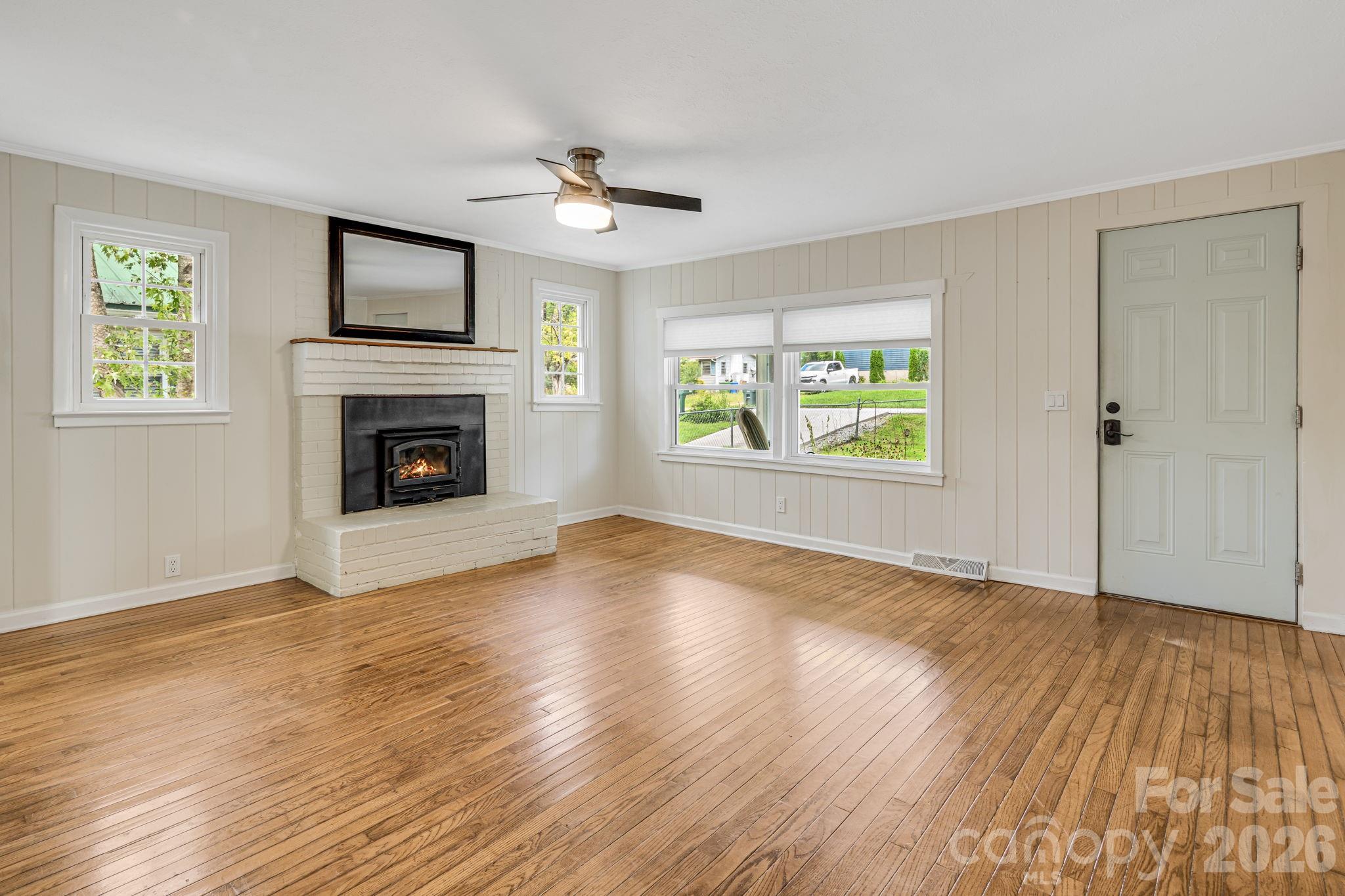 Living room view facing the front door. - 1015 Mountain View Street, Hendersonville
