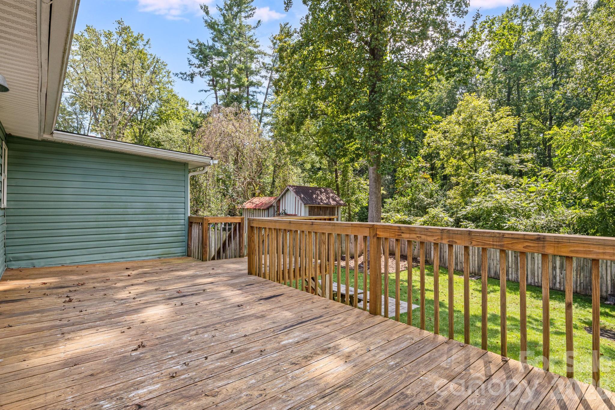 Large deck overlooking backyard. - 1015 Mountain View Street, Hendersonville