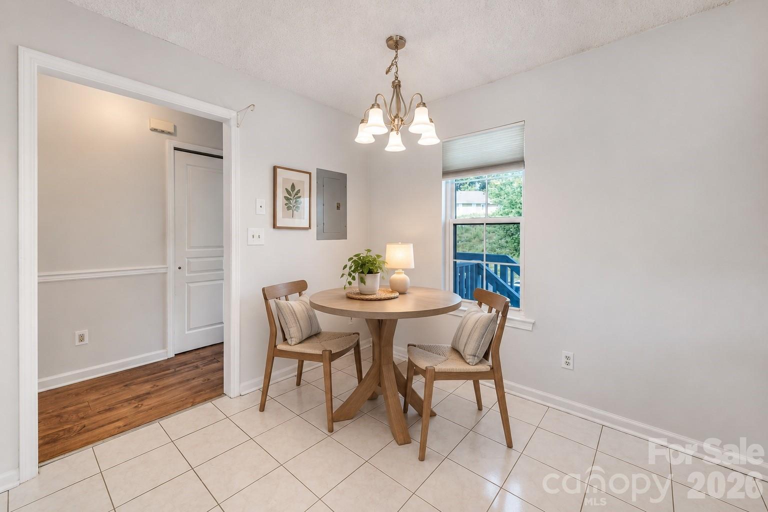 Virtually staged breakfast nook - 4702 Breakers Lane, Asheville