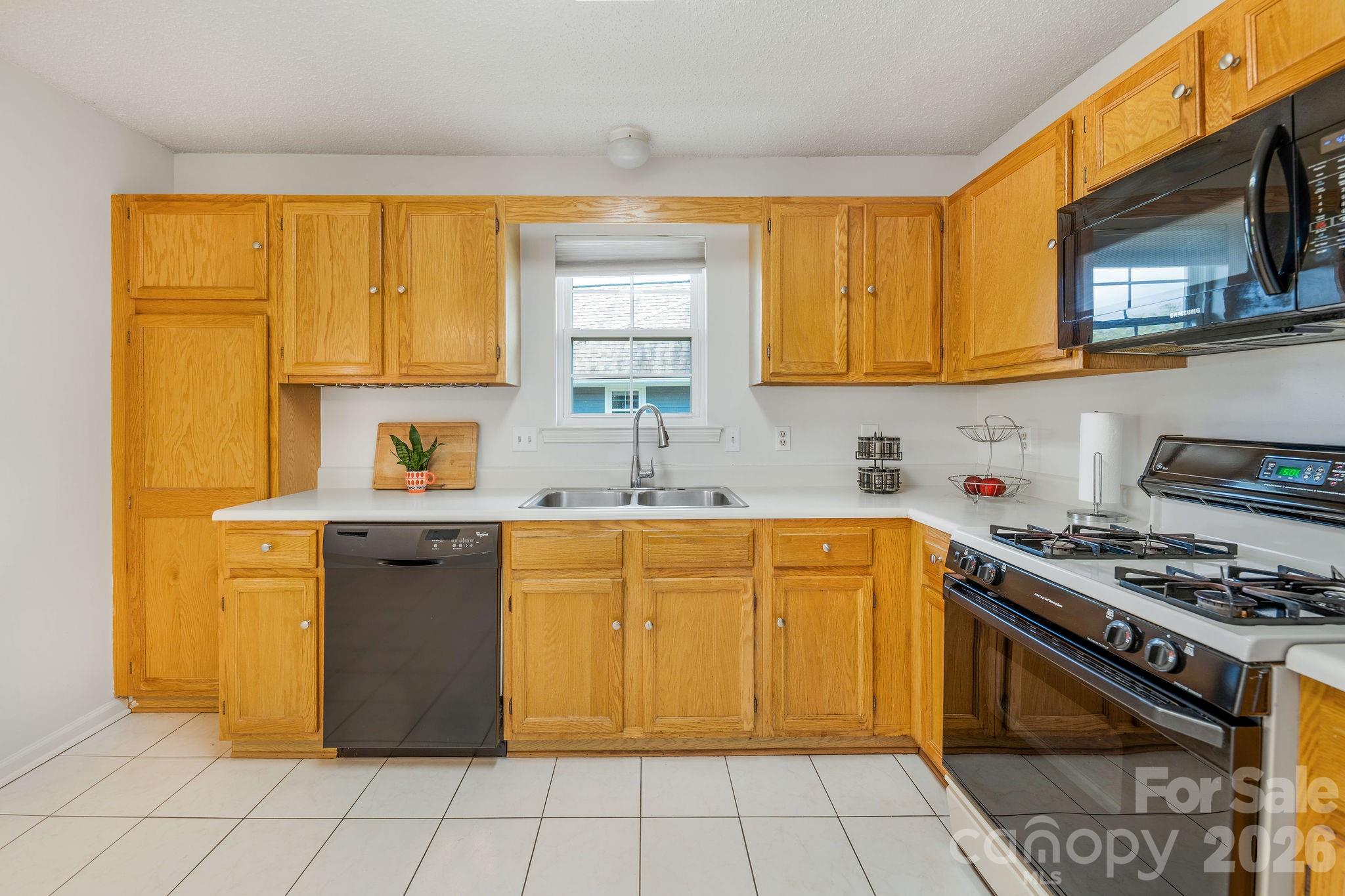Spacious kitchen with lots of cabinet storage - 4702 Breakers Lane, Asheville