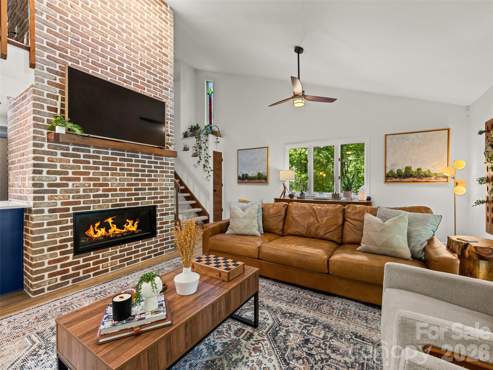 Vented gas fireplace in living room - 16 Cedarwood Drive, Asheville