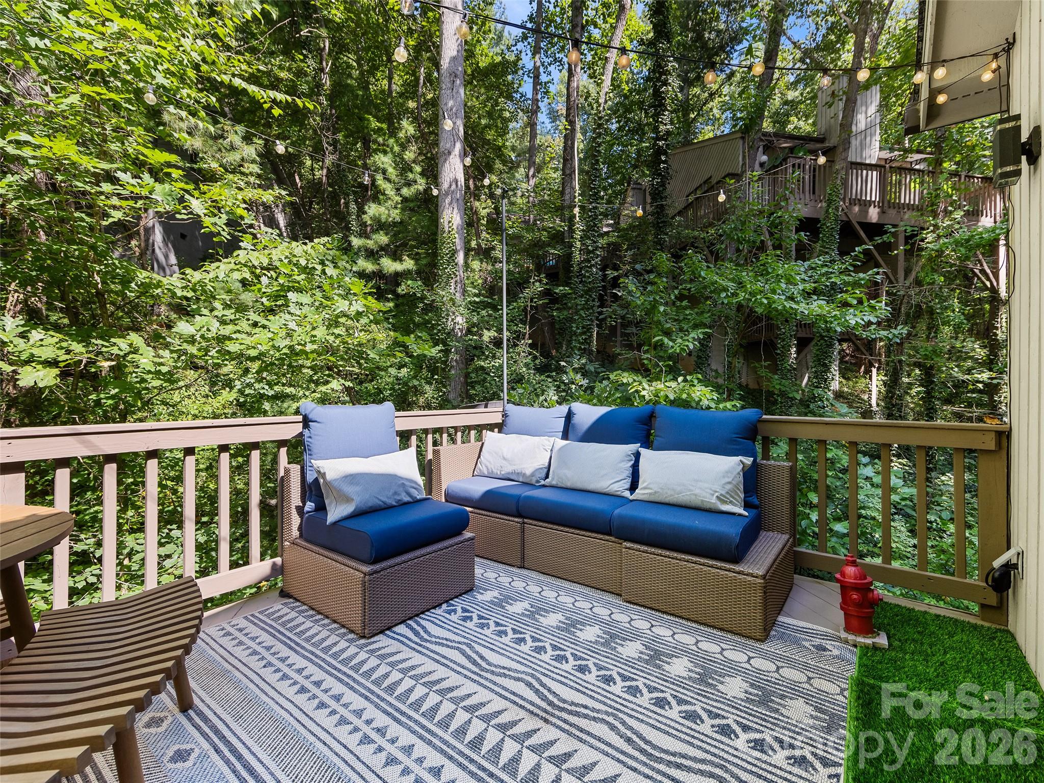 Shaded and private back porch - 16 Cedarwood Drive, Asheville