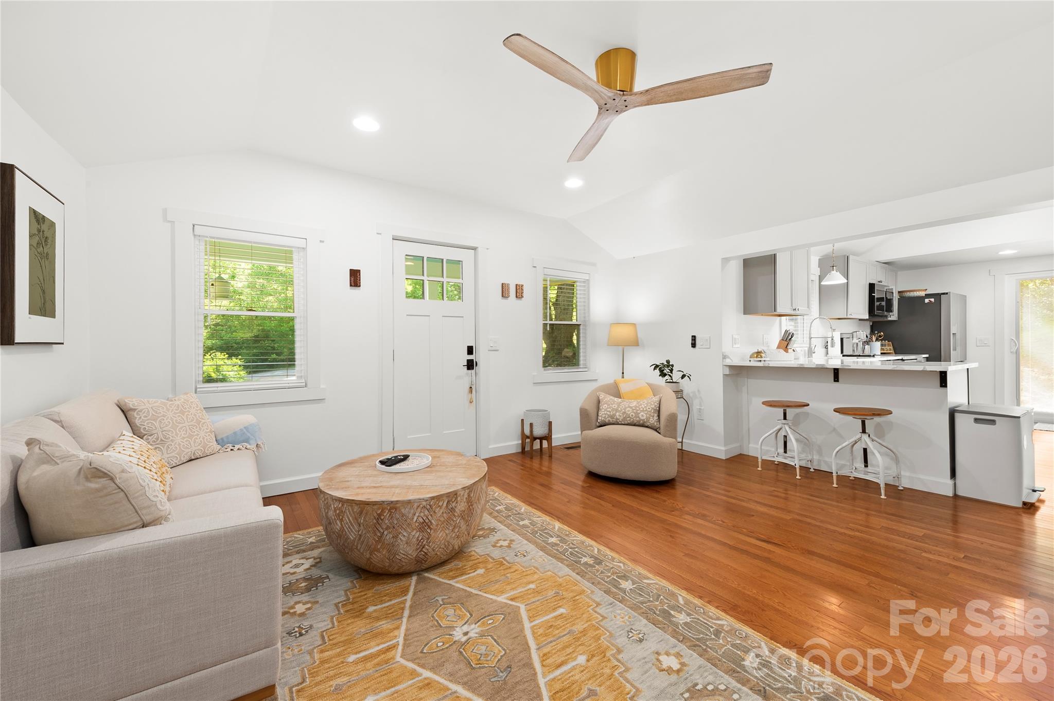 All new windows and vaulted ceilings create a space filled with natural light. - 121 Sugar Cove Road, Weaverville