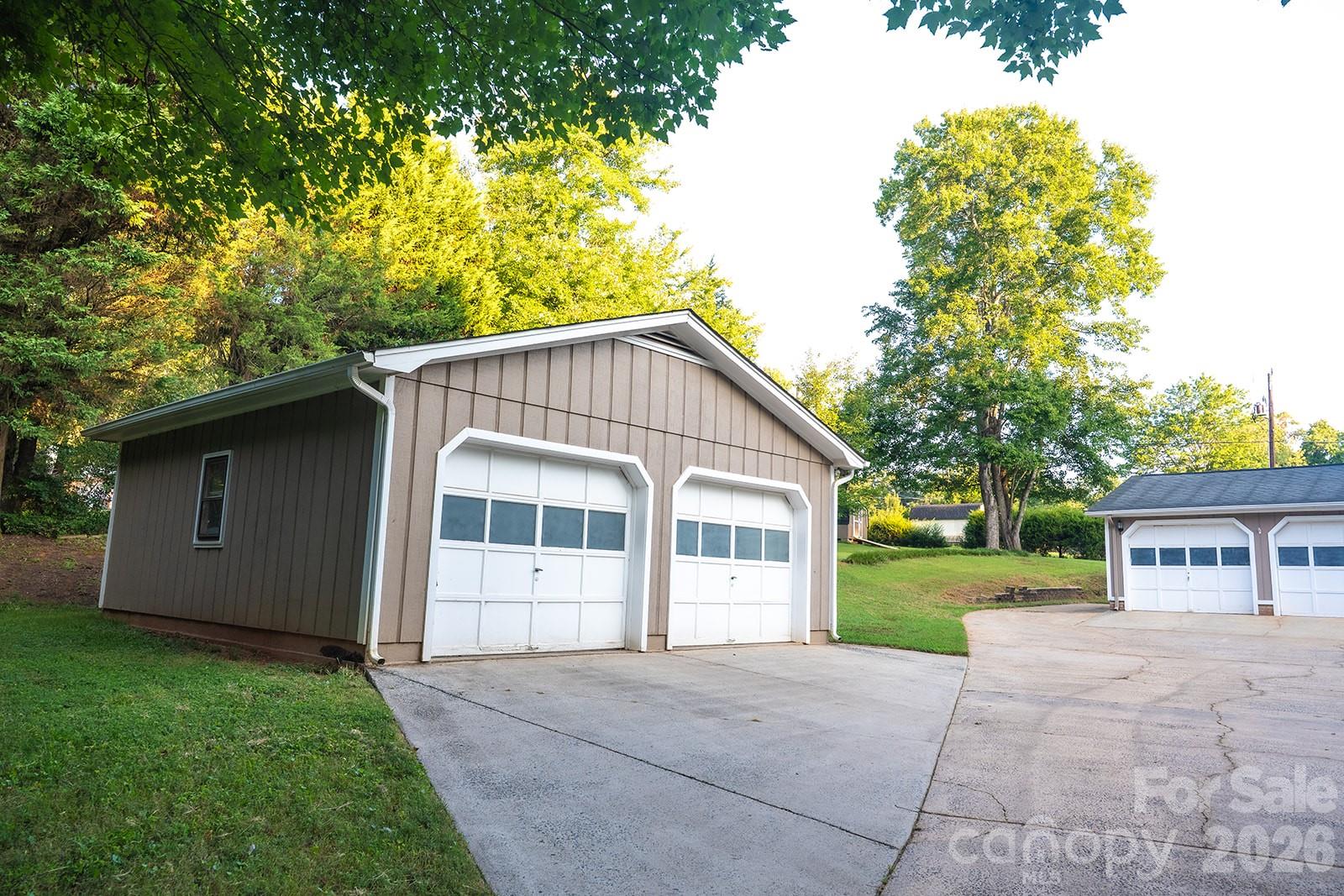 Detached garage is close on the driveway - 3401 Tracelake Drive, Matthews