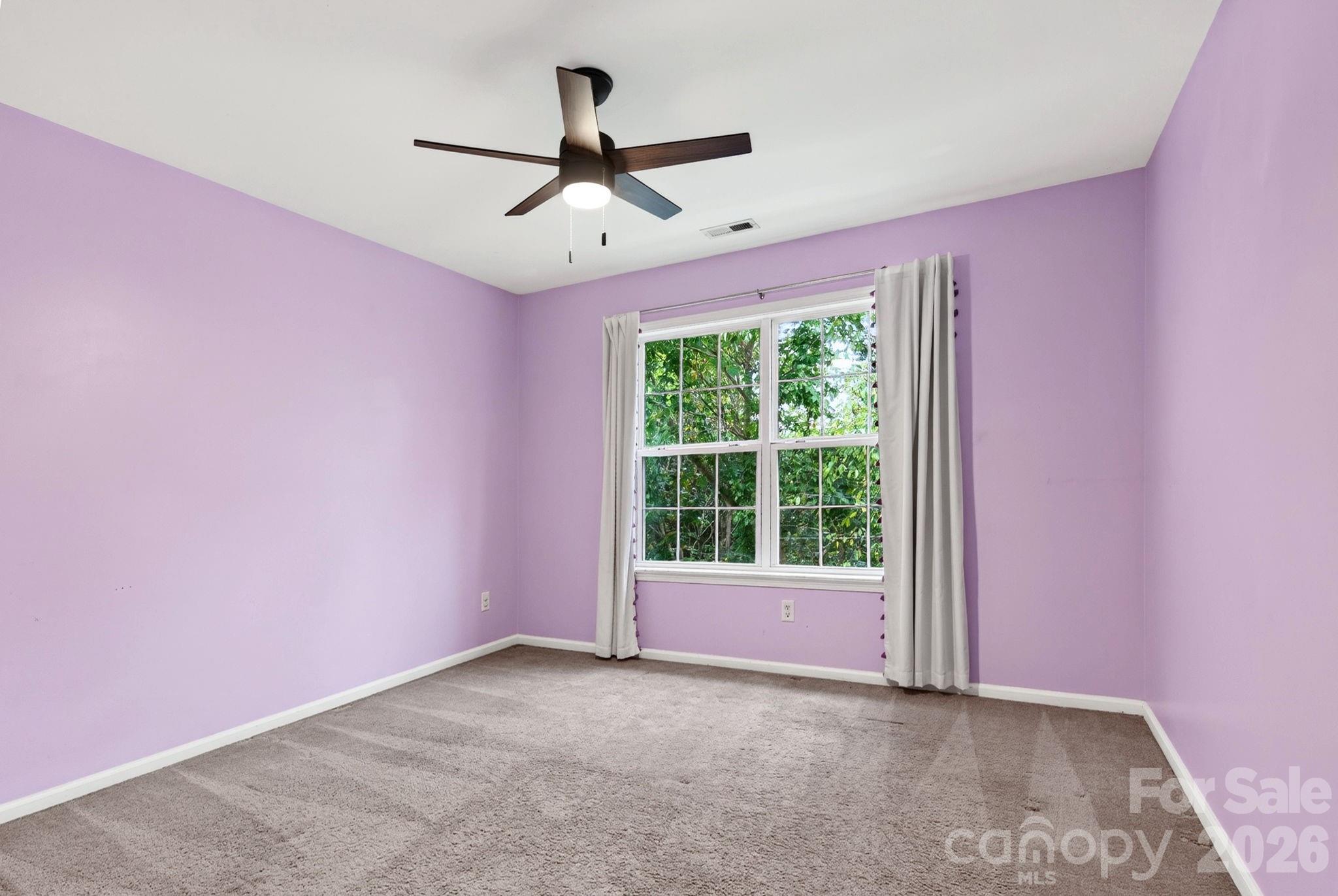 Bedroom Looks Out into Private Backyard - 9 Carraway Court, Asheville