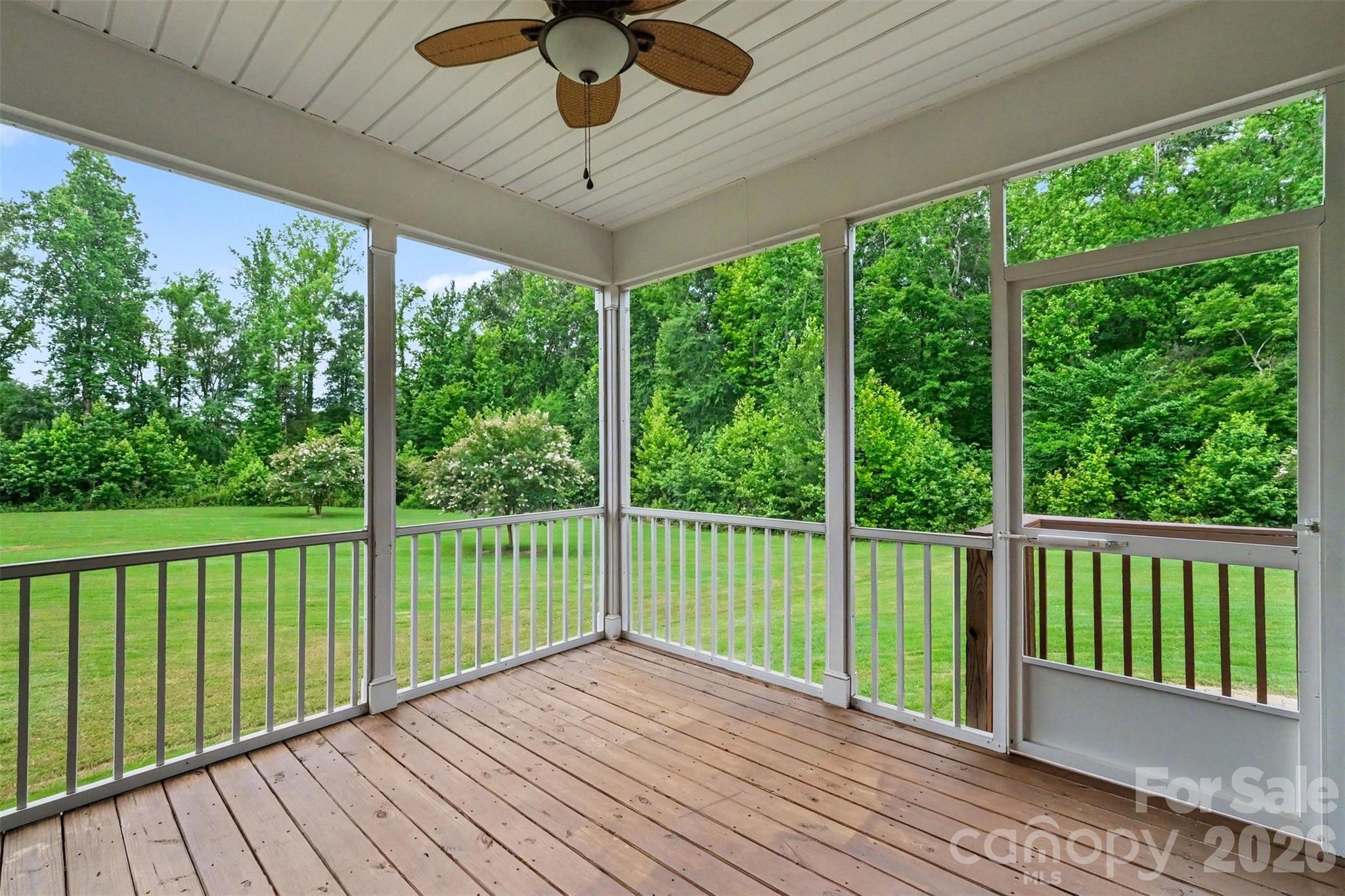 Screened in porch with serene backyard views - 2521 Surveyor General Drive, Waxhaw