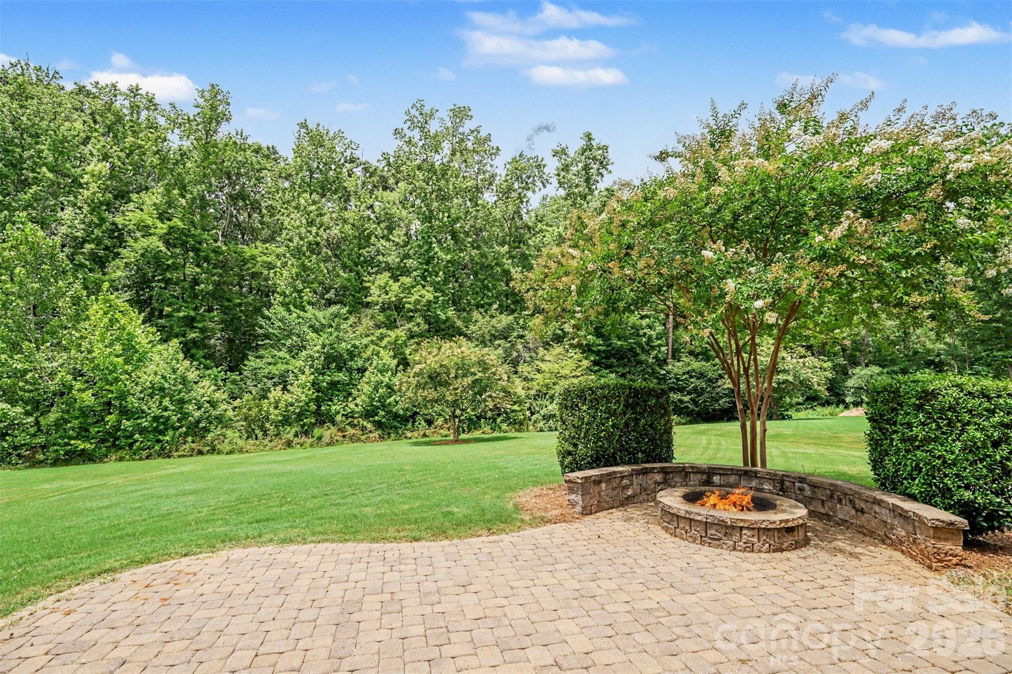 Paver patio with firepit and seating - 2521 Surveyor General Drive, Waxhaw