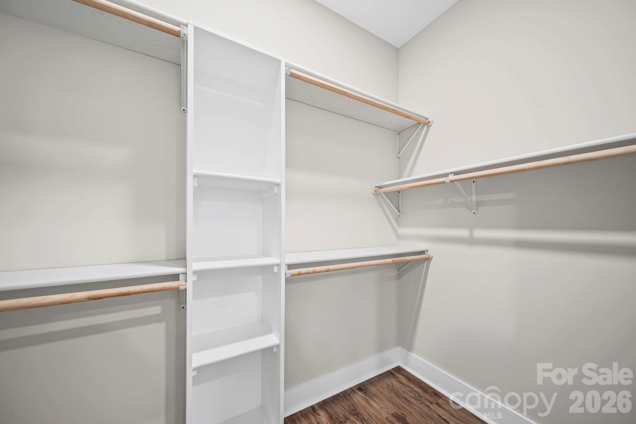 Walk-in closet in primary bedroom - 224 Plantation Way, Mount Gilead