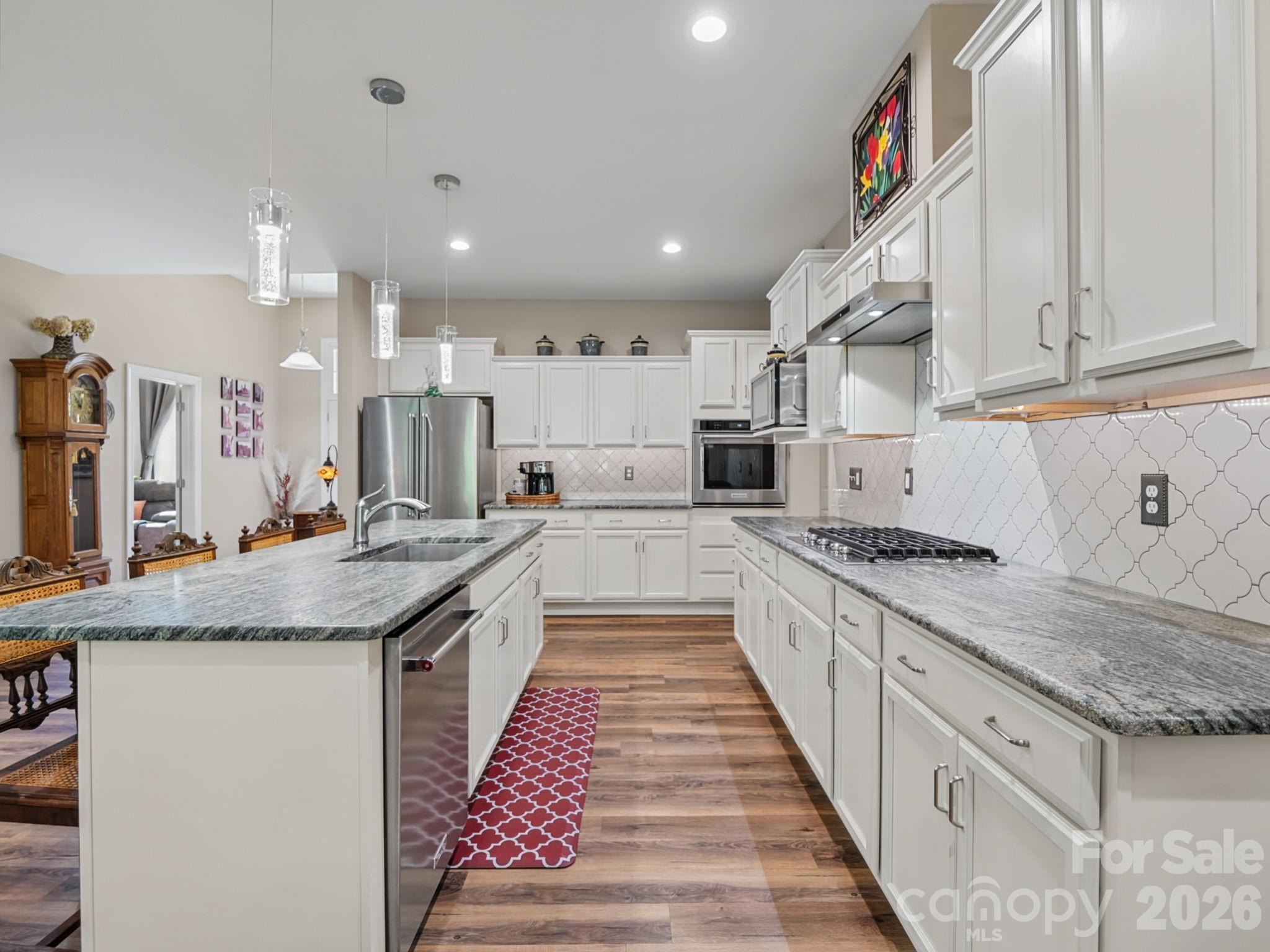 Kitchen – Leathered Granite Countertops - 168 Willow Place Circle, Hendersonville