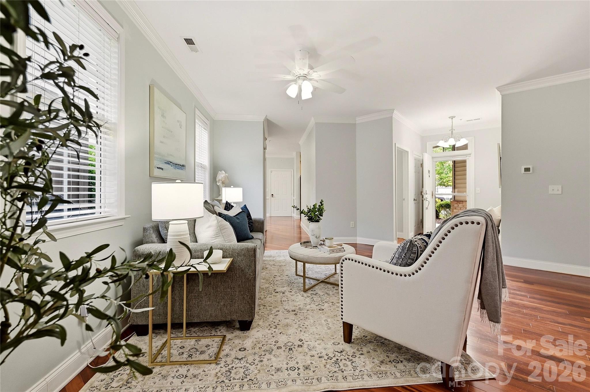 Flexible sitting or dining area provides additional living space with hardwood floors and abundant natural light. - 9009 Rosalyn Glen Road, Cornelius