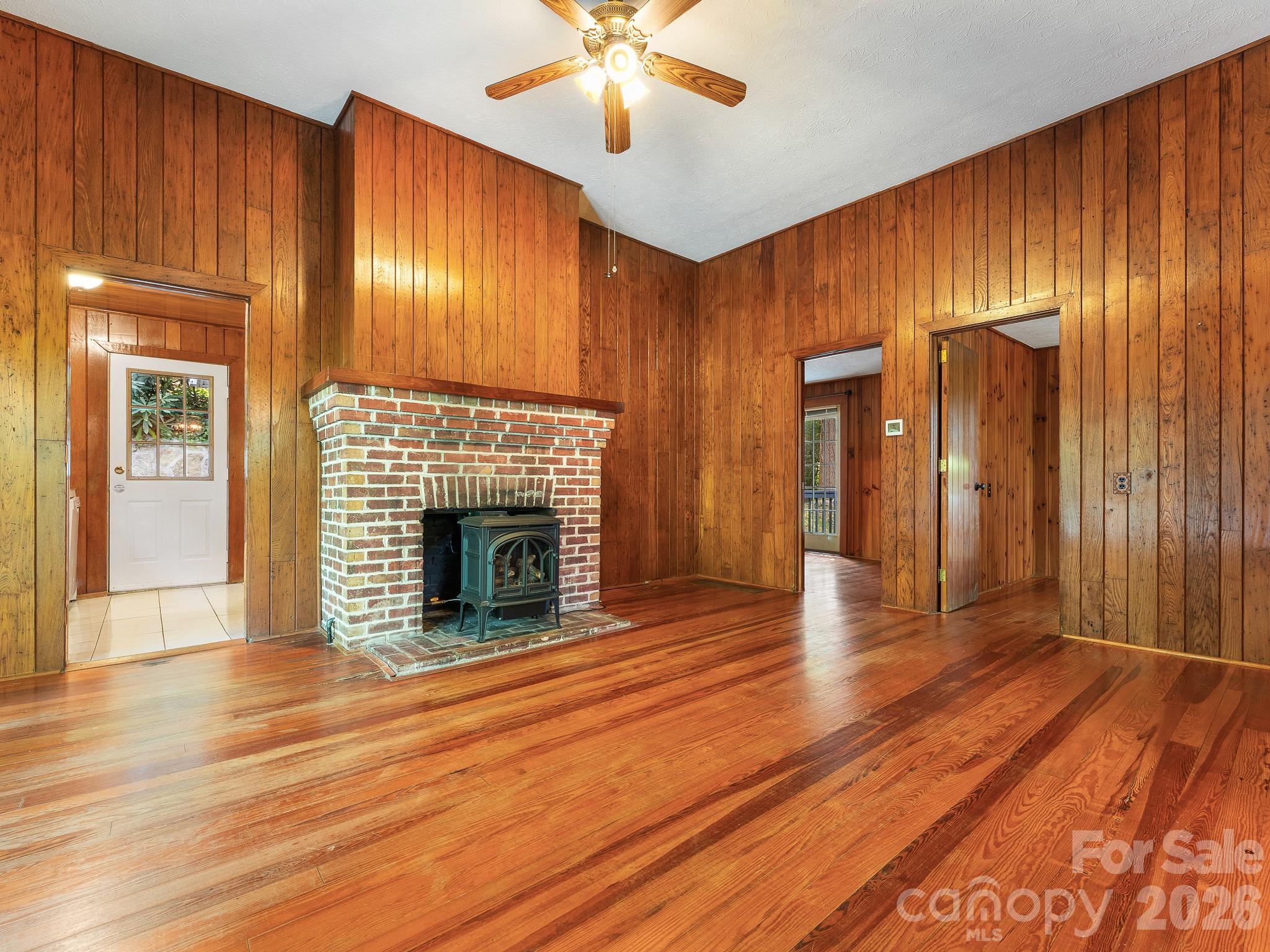 Livingroom with Yotul propane stove - 240 Seneca Boulevard, Hendersonville