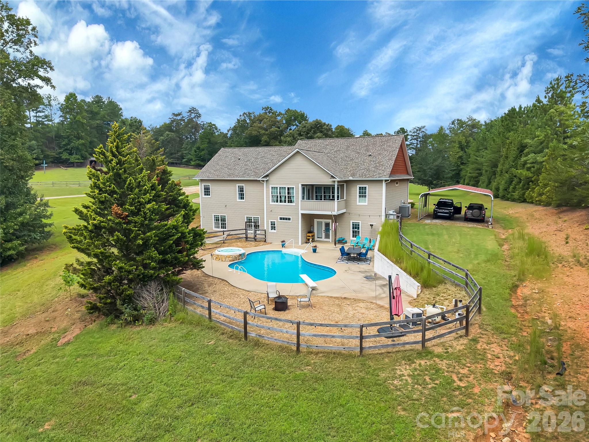 The setting for this home is private and quiet, yet just minutes to Tryon International Equestrian Center, shopping and restaurants. - 27 & 56 Troy Lane, Tryon
