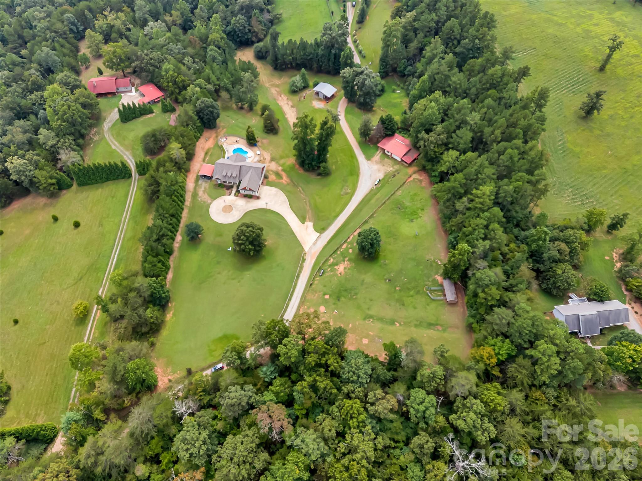 TWO HOUSES come with this parcel! In an area of horse farms and right next door to TIEC Horse Park property and Mercer holdings. - 27 & 56 Troy Lane, Tryon