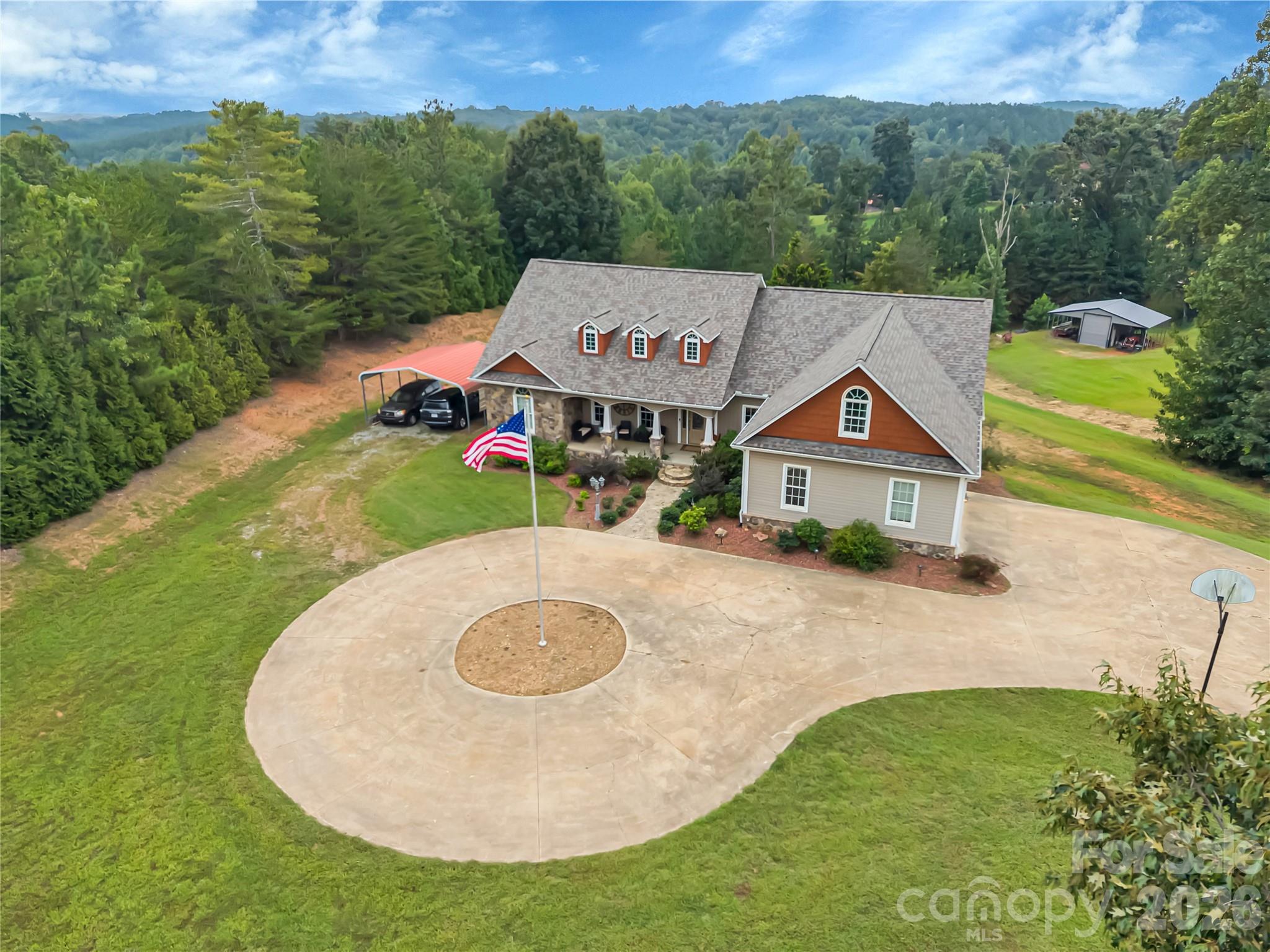 This is an absolutely move-in ready property, it has been beautifully maintained inside and out, including new roofs. Recently cleared areas are scheduled for re-seeding this fall. - 27 & 56 Troy Lane, Tryon