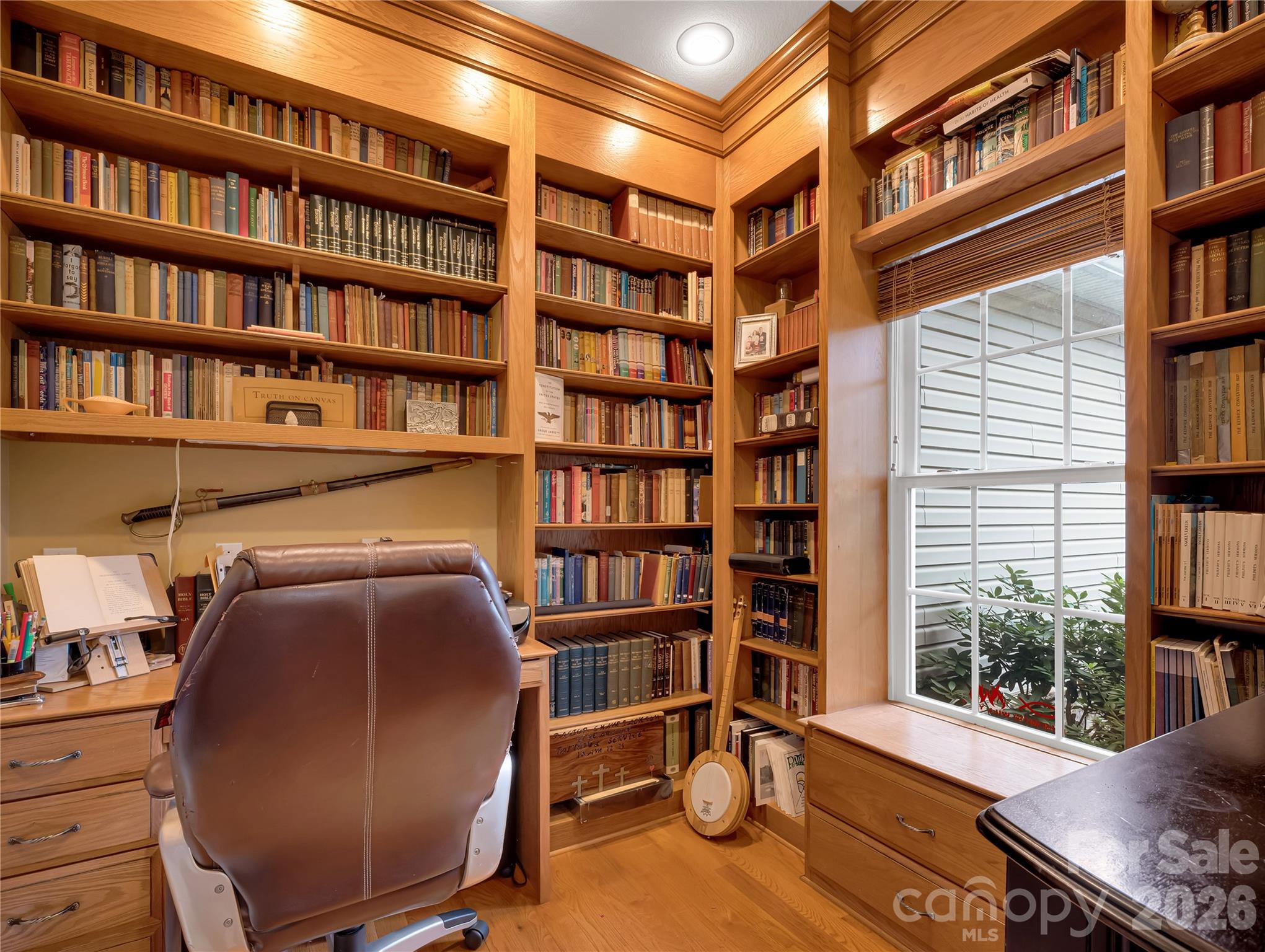 Home Office is an elegant and useful space. Lovely custom shelving and built-ins make this space a special retreat! - 27 & 56 Troy Lane, Tryon