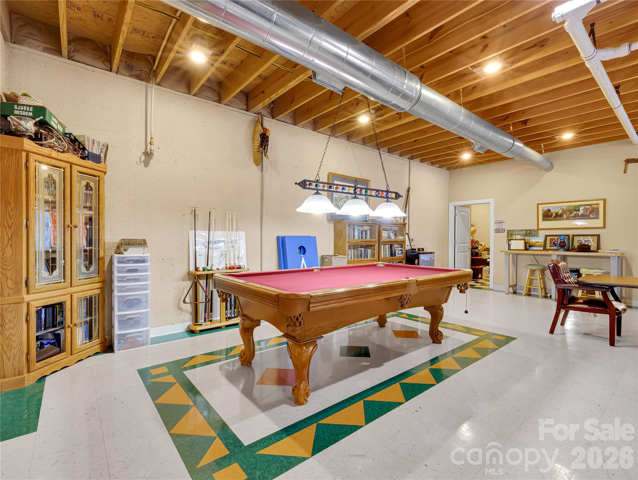 This massive space is perfect for entertaining and family activities. - 27 & 56 Troy Lane, Tryon