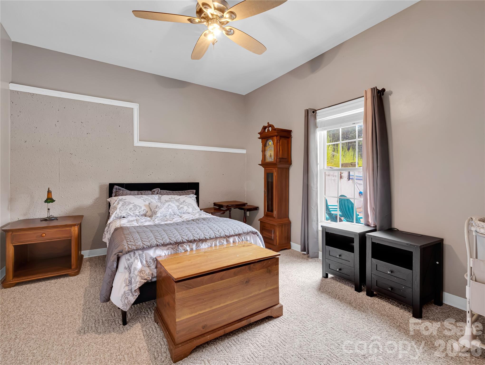 4th Bedroom is on the lower level has lots of natural light, a large storage closet and it looks out over the pool area! - 27 & 56 Troy Lane, Tryon