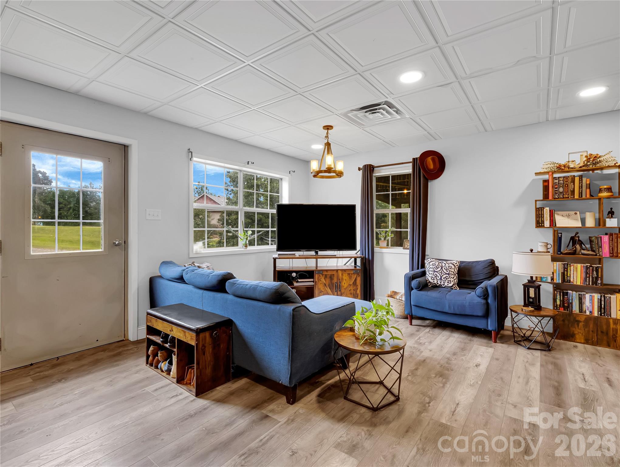 The 908 sf guest house is a huge asset to the property, it has a full bathroom, large bedroom with attached laundry, walk in closet or storage room, and a spotless kitchen space with good storage. - 27 & 56 Troy Lane, Tryon