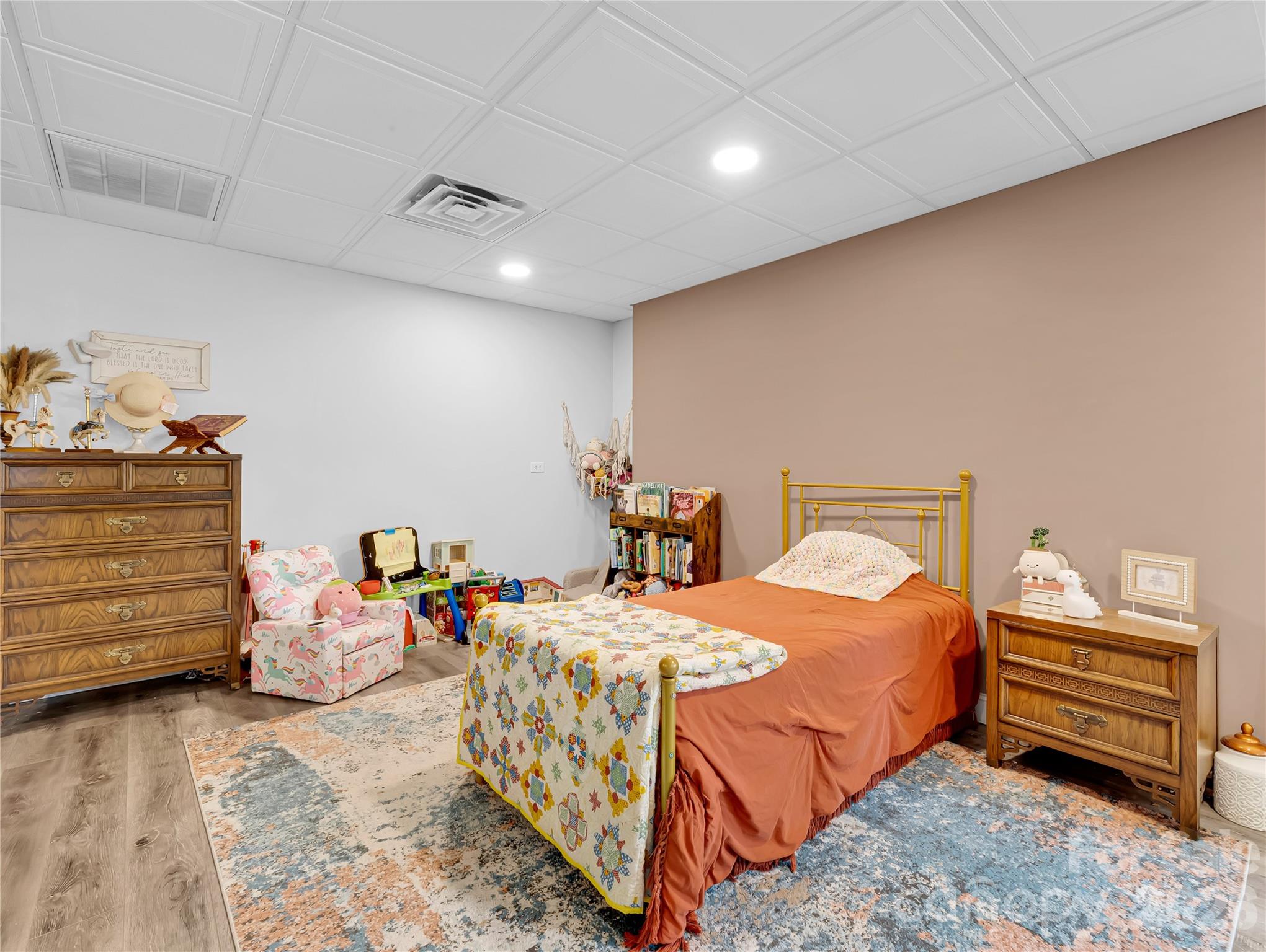 The dining area in the guest house is currently used as a second bedroom space that opens out to the living room. - 27 & 56 Troy Lane, Tryon