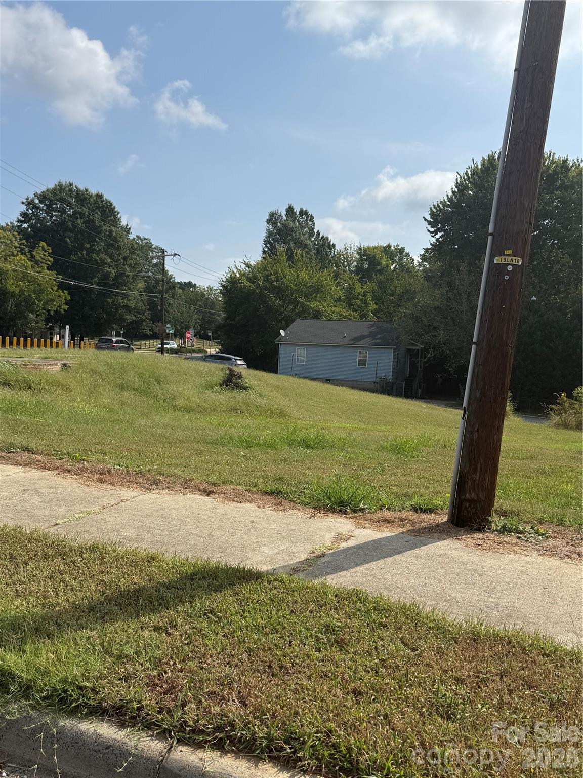 Sloped lot front he 1730 Pegram vantage point that is also packaged with the 1200 Parkwood Ave. - 1200 Parkwood Avenue, Charlotte