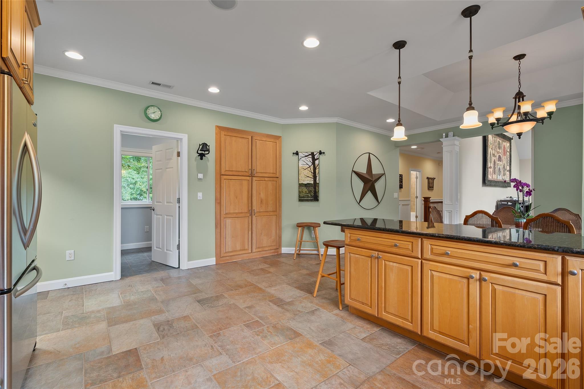Spacious kitchen with abundant cabinetry, newer appliances and generous workspace. - 174b Marina Cove, Waynesville