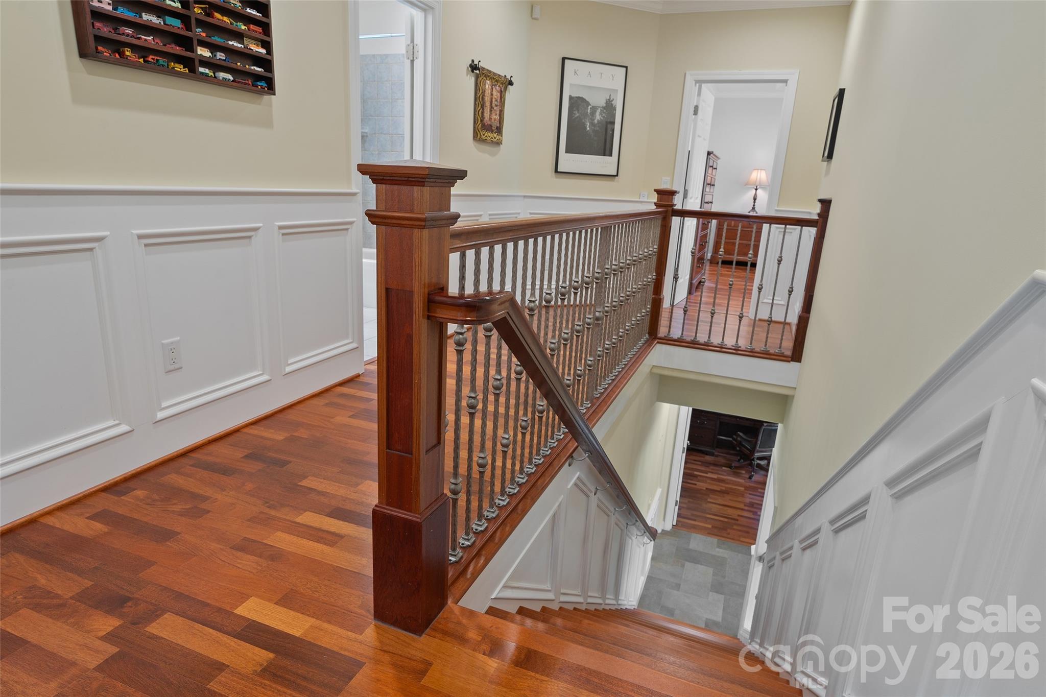 Quality craftsmanship is evident in the home's staircase, trim and architectural detailing. - 174b Marina Cove, Waynesville