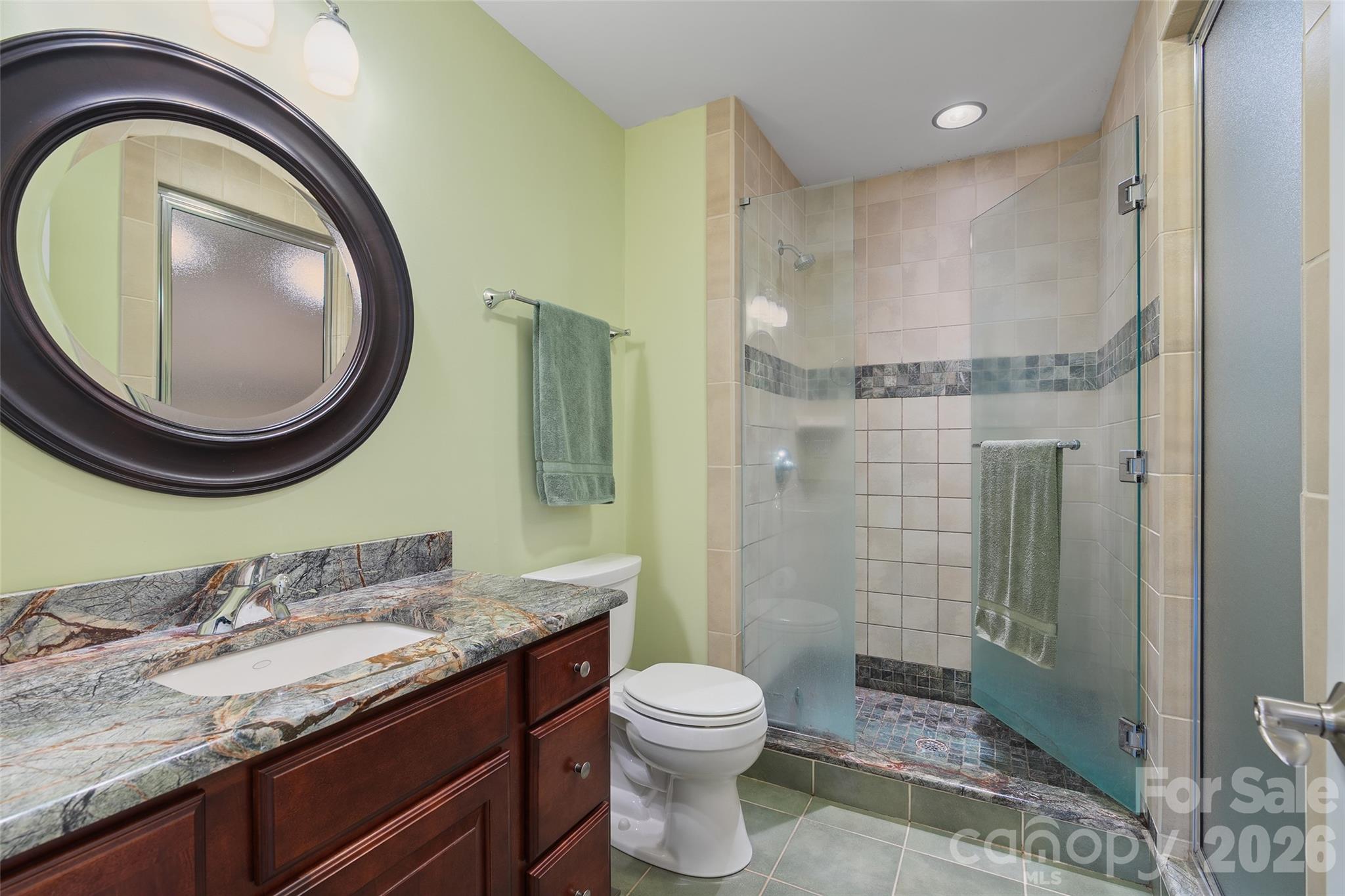 Beautifully tiled bath with adjacent and spacious walk-in steam room. - 174b Marina Cove, Waynesville