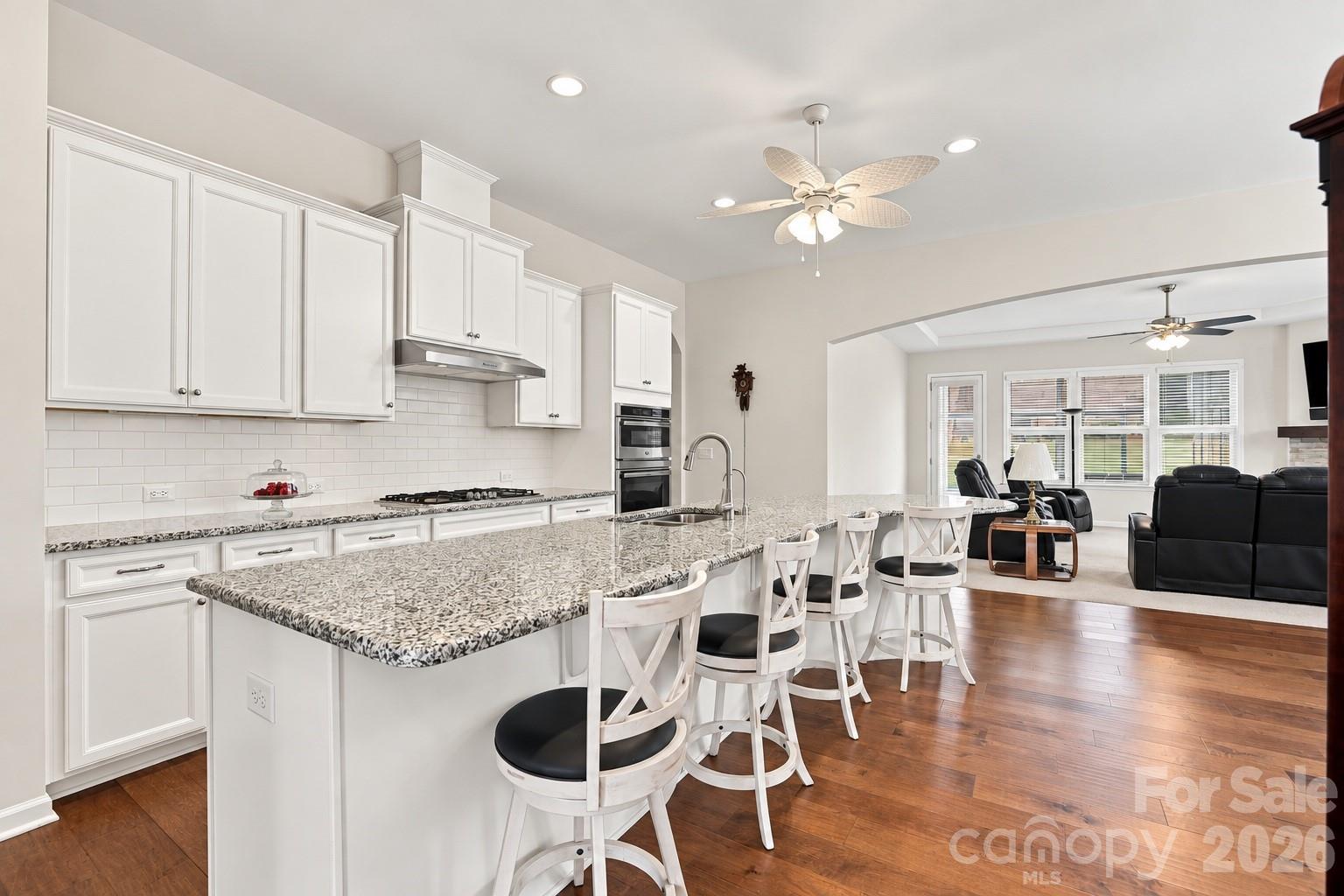 Kitchen features open sight lines to the great room, keeping conversation flowing and everyone connected while cooking. - 8504 Hope Run Court, Indian Land