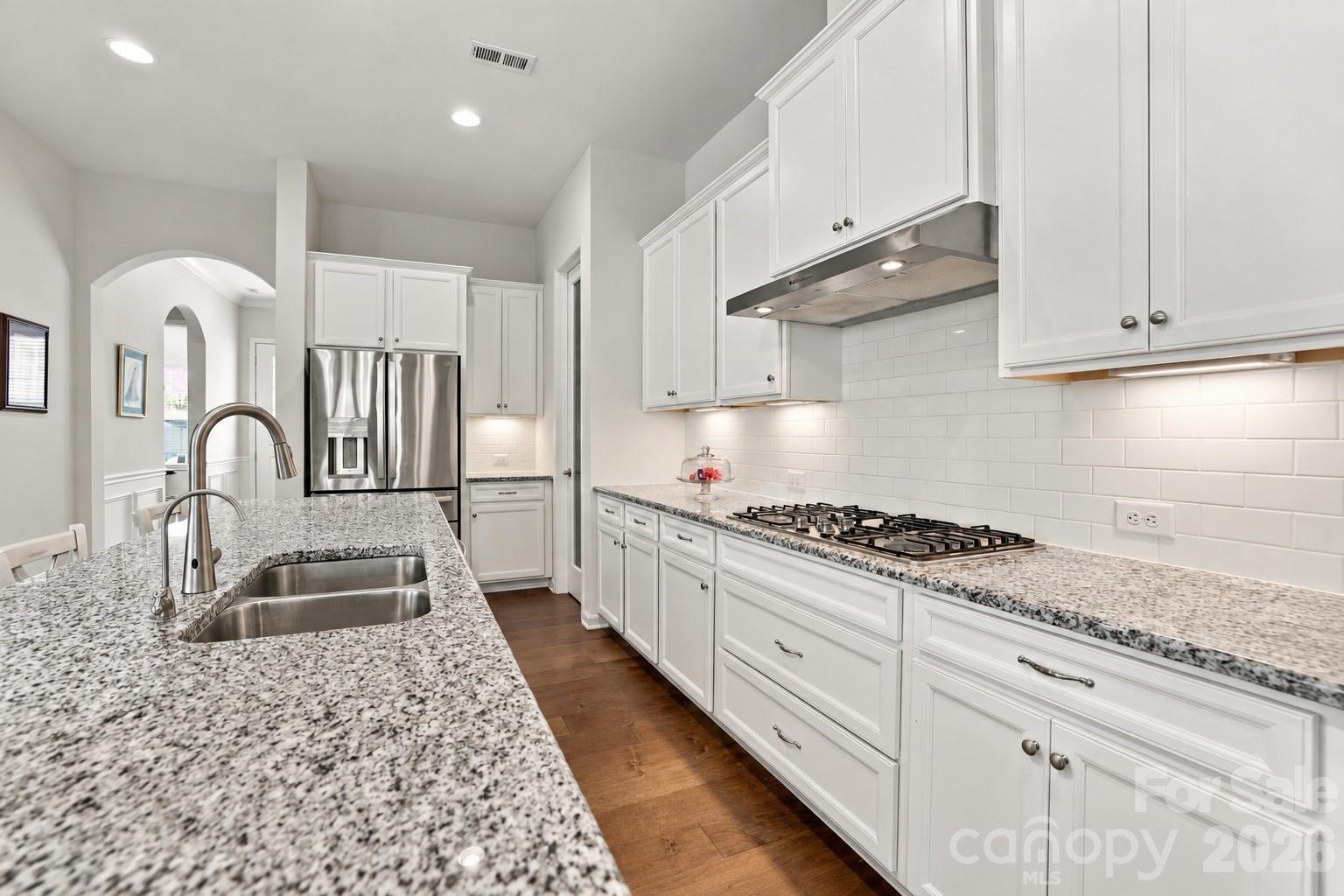 Designed for real life: kitchen makes everything from busy mornings to weeknight dinners to entertaining a crowd effortless. - 8504 Hope Run Court, Indian Land