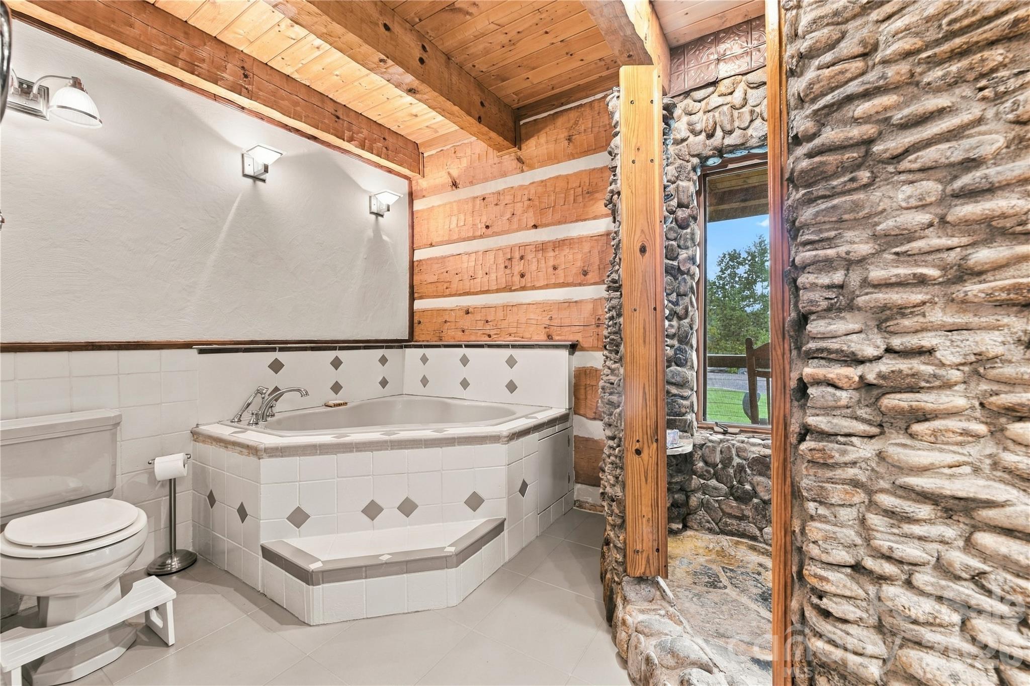 Rock Shower bathroom - 237 Murdock Road, Bakersville