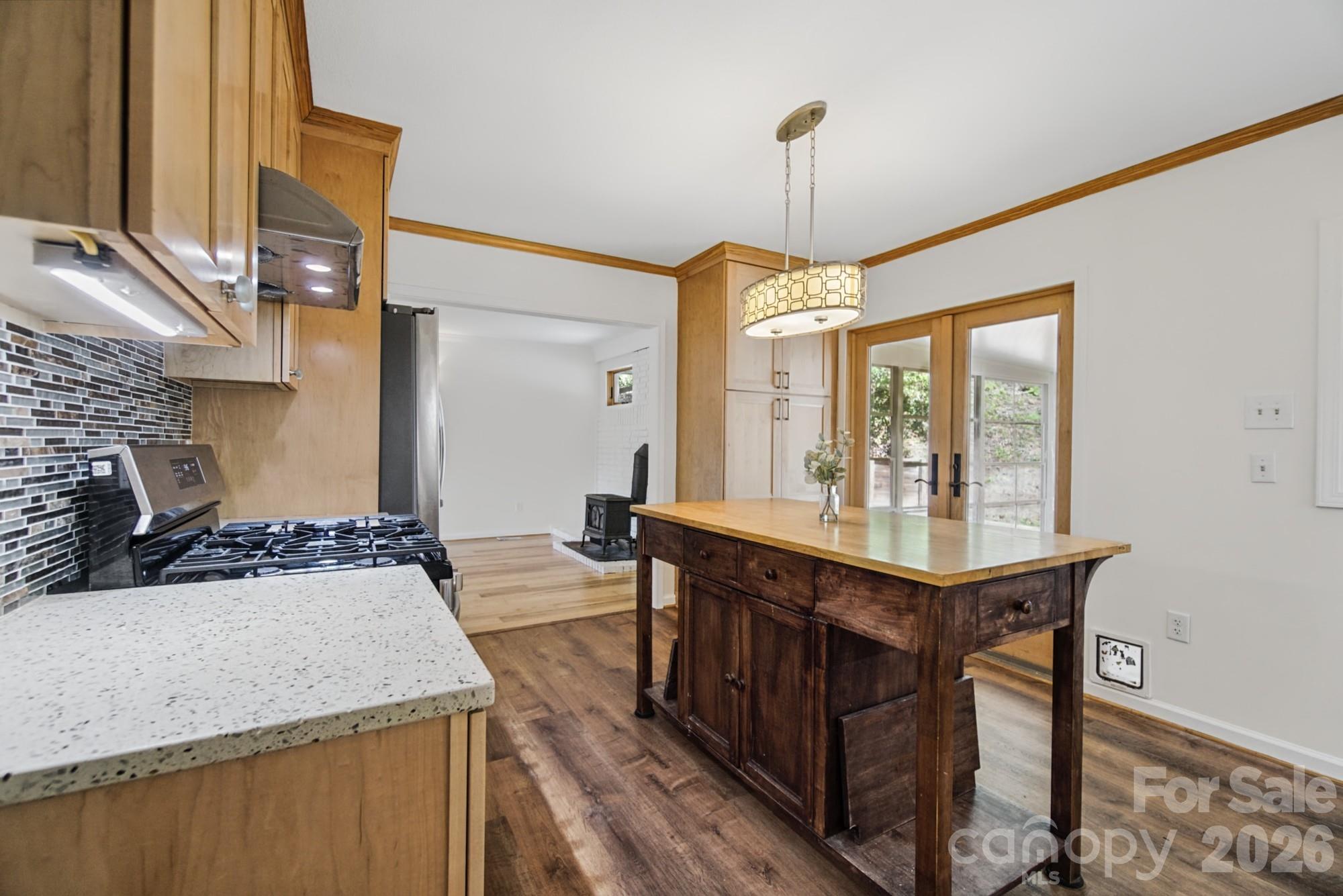 Kitchen opens into sunroom - 35 Clement Drive, Asheville