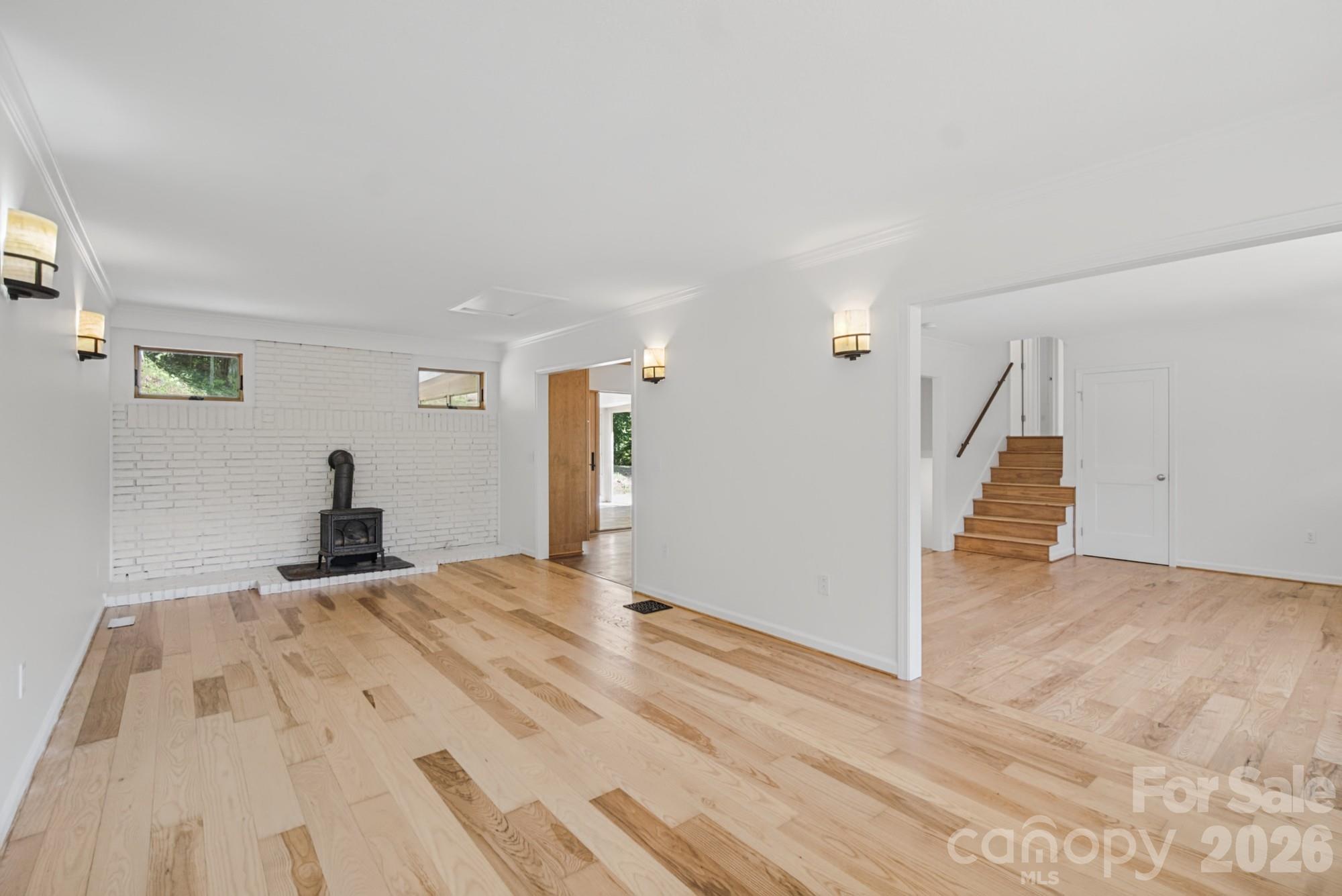 Vented gas fireplace in dining/living room - 35 Clement Drive, Asheville